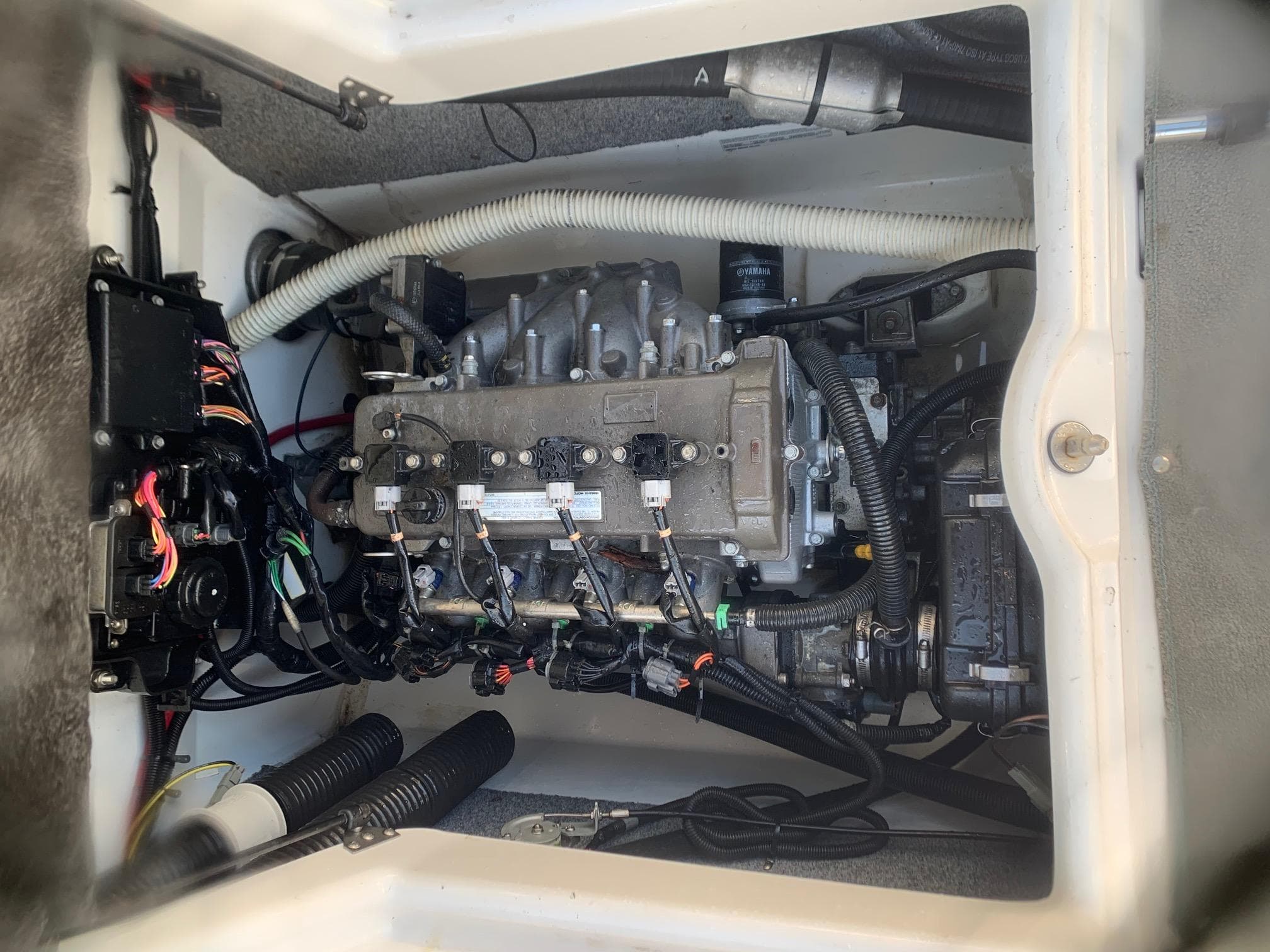Engine compartment of a 2012 Yamaha Boats SX190.