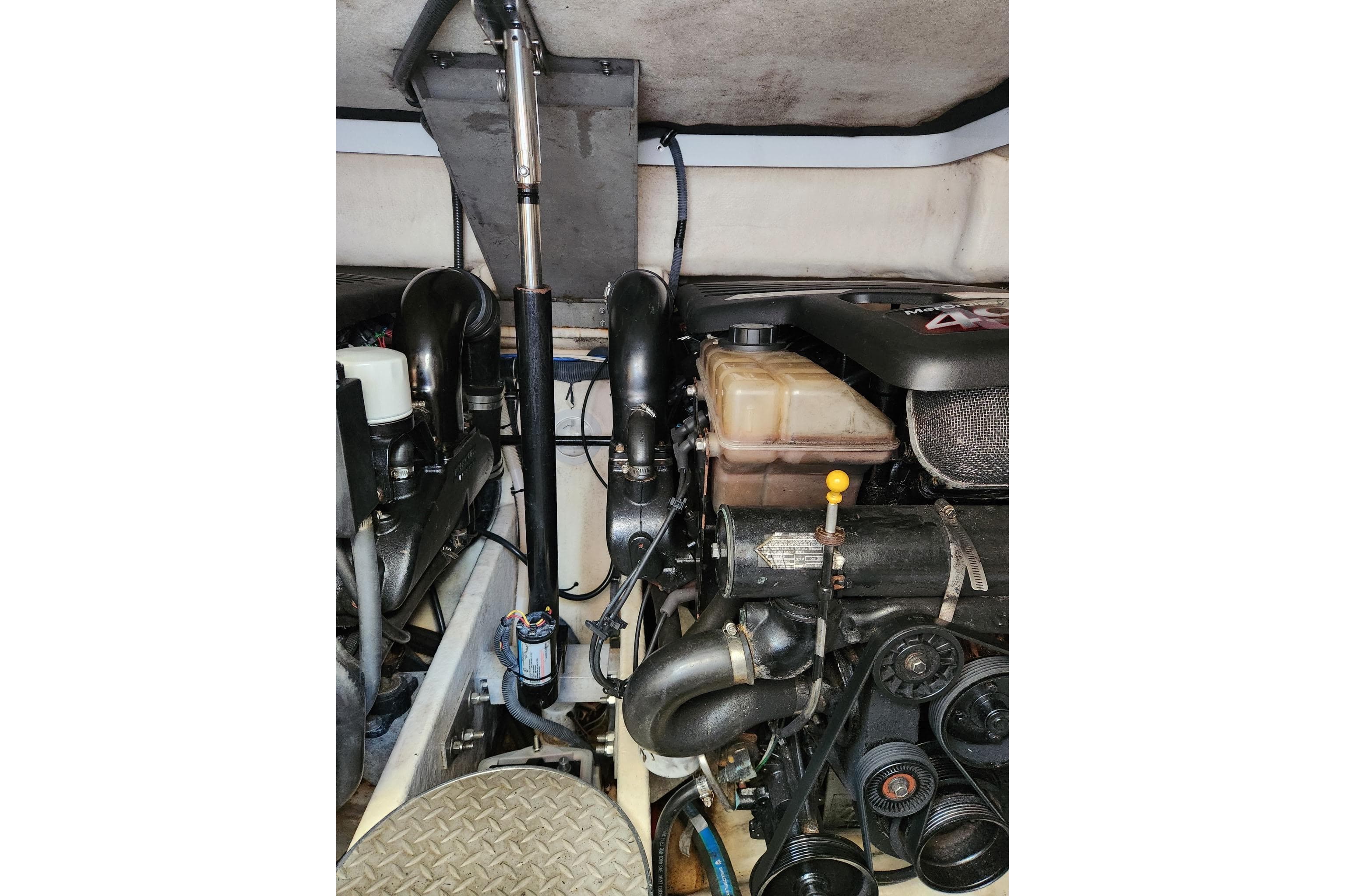 Engine compartment of a 2004 Formula 37 Performance Cruiser, showcasing mechanical components.