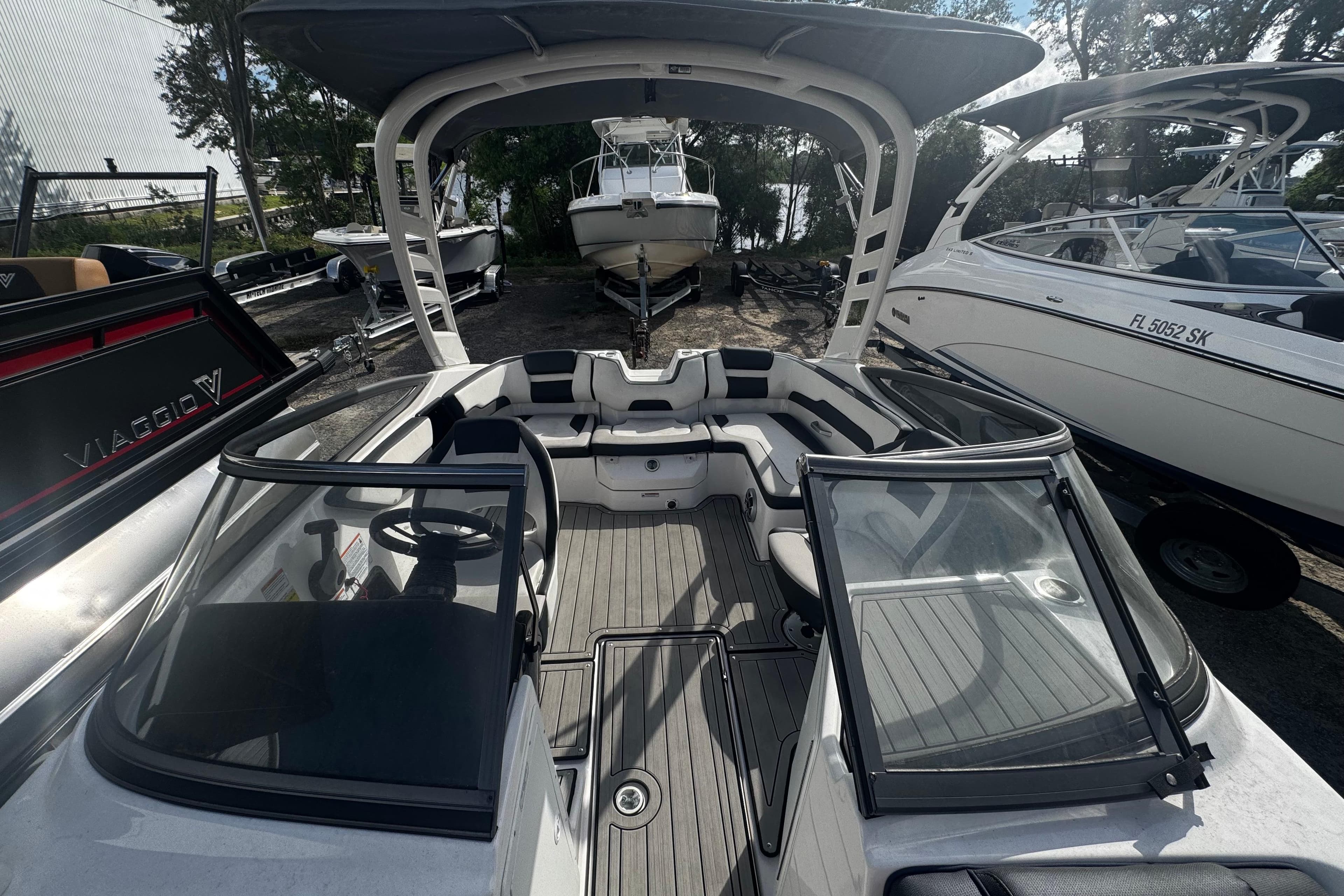 2021 Yamaha Boats 195S interior view, showcasing sleek seating and modern design.