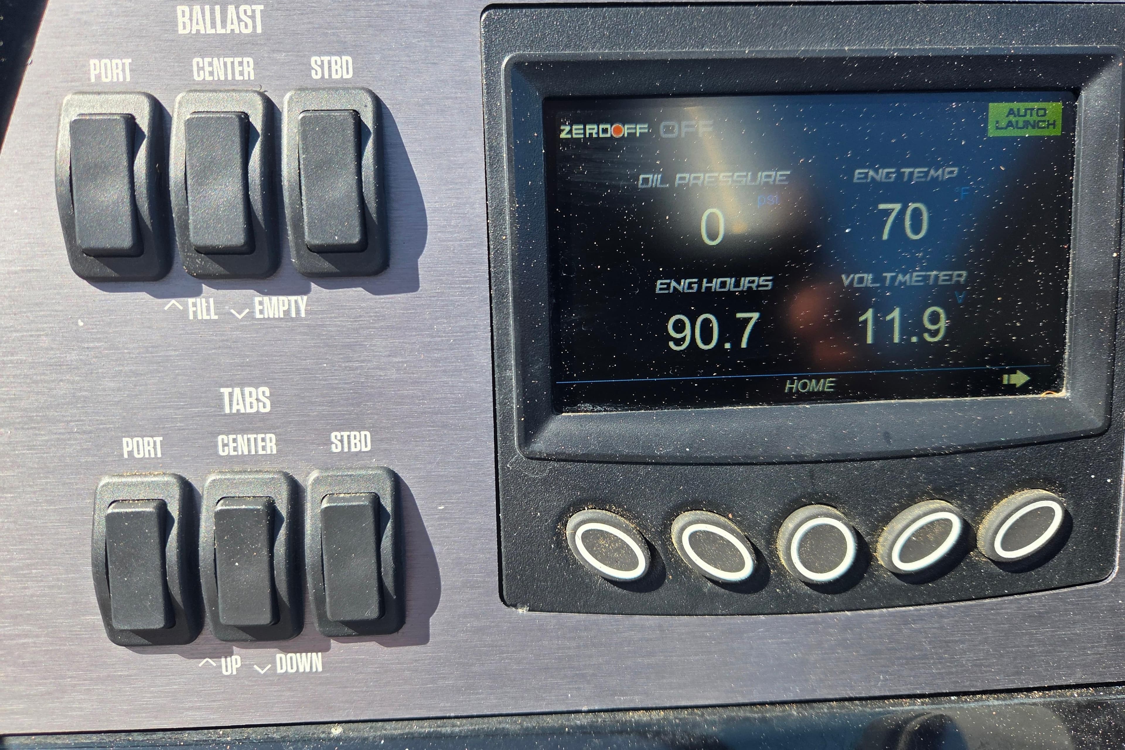 Control panel of 2022 MasterCraft NXT24 boat showing ballast and engine data.