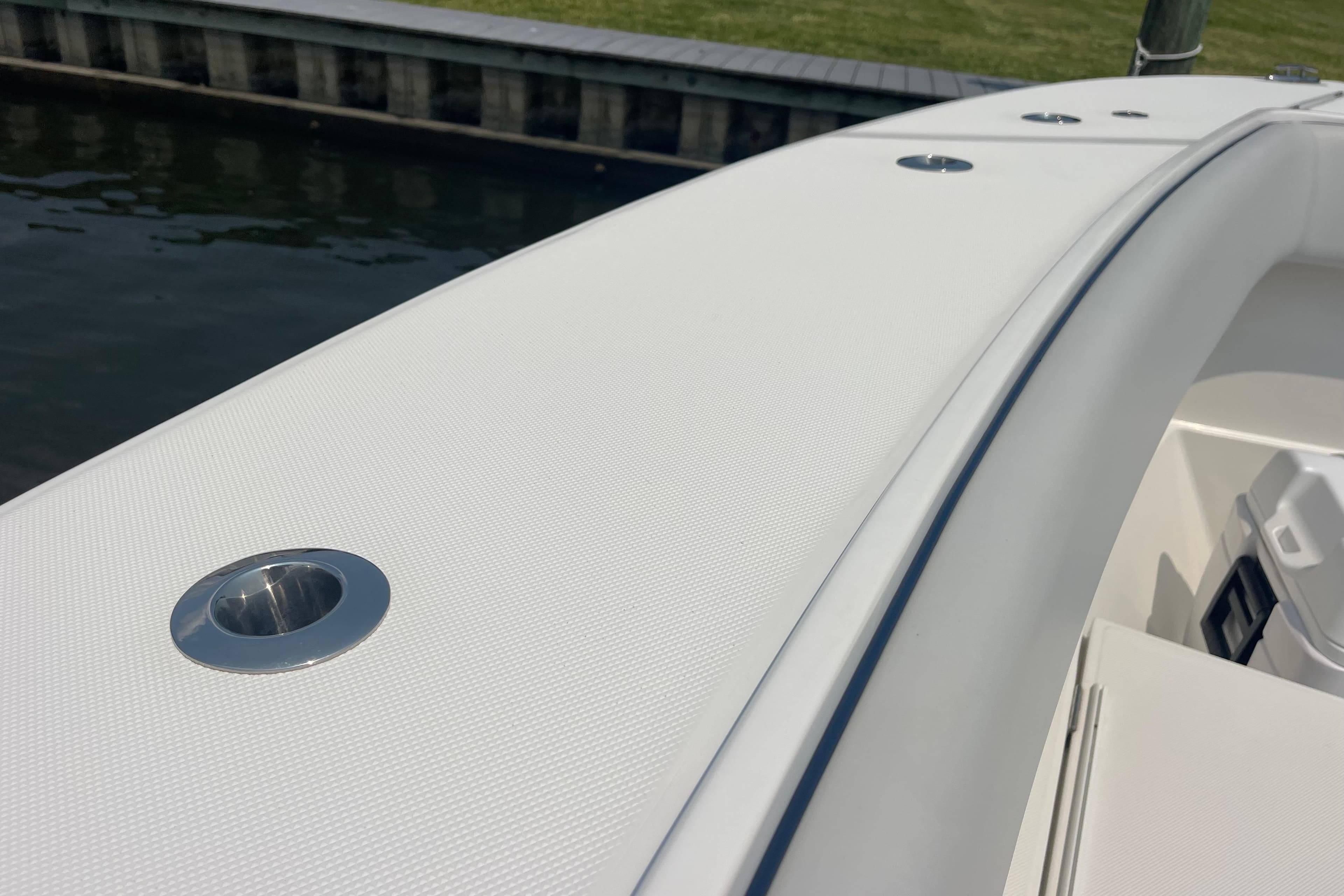 2020 Jupiter 38 boat deck with stainless steel fittings, dockside view.