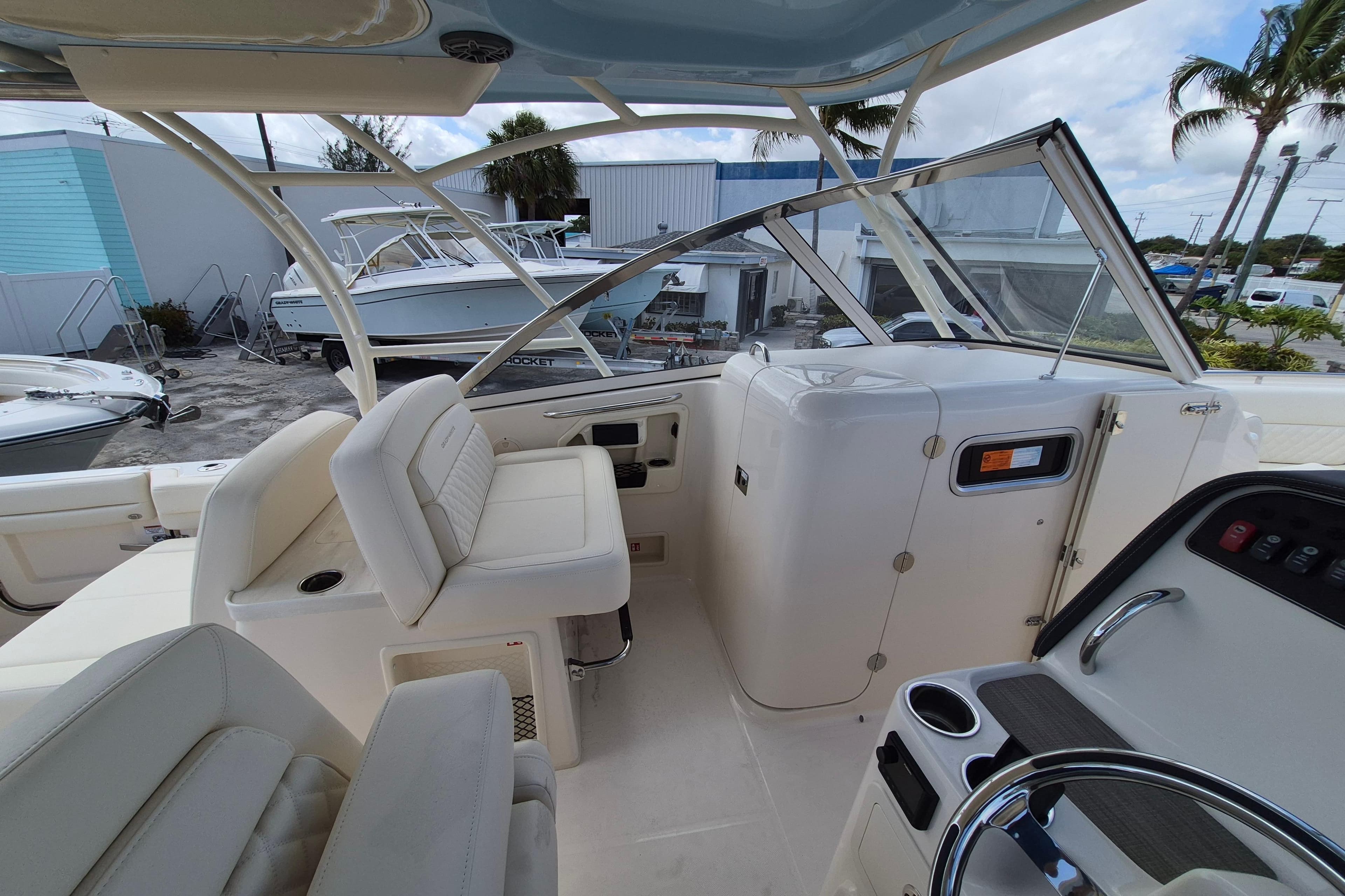2026 Grady-White Freedom 307 boat interior with seating and helm station.
