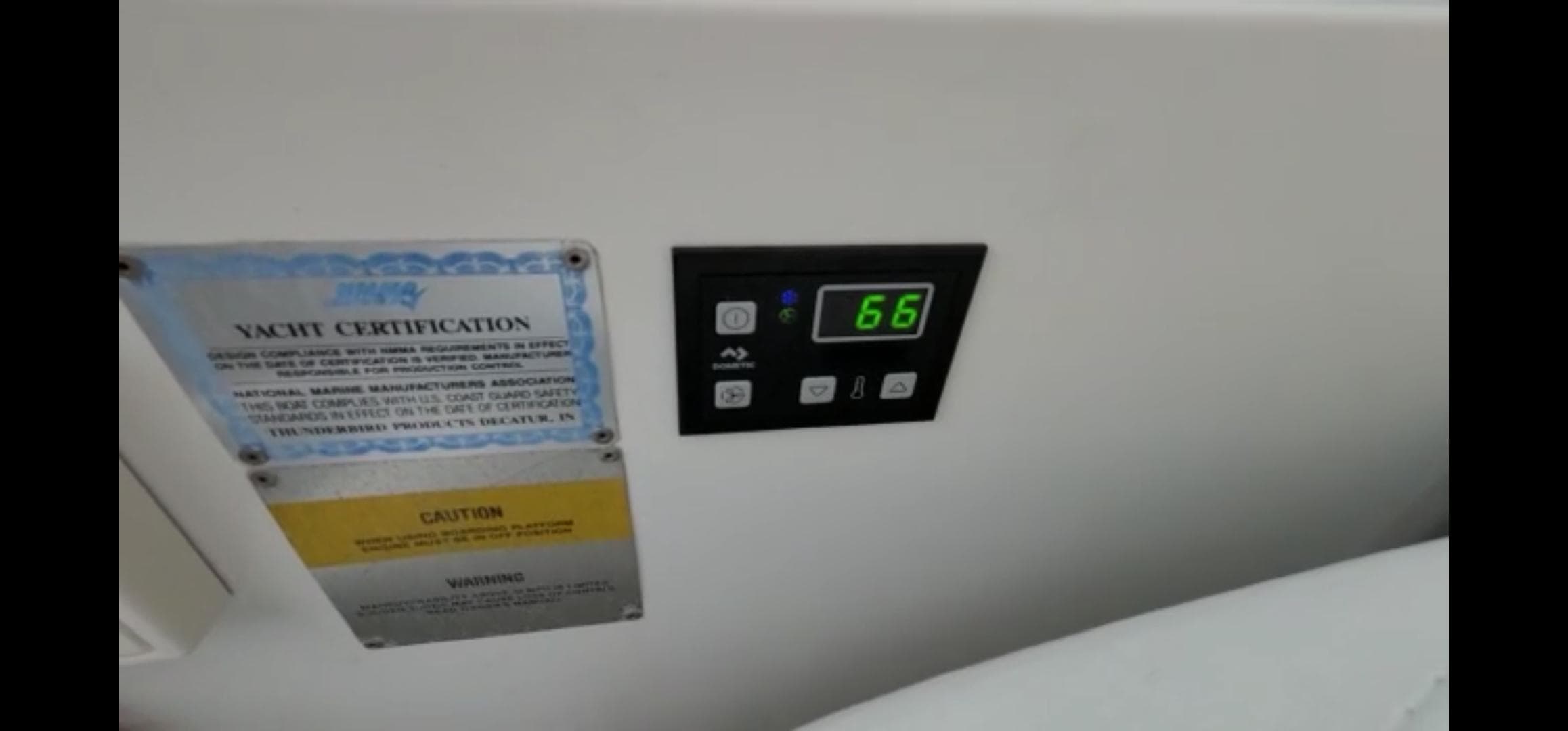 Digital control panel and yacht certification on a 2004 Formula 330 SS boat.