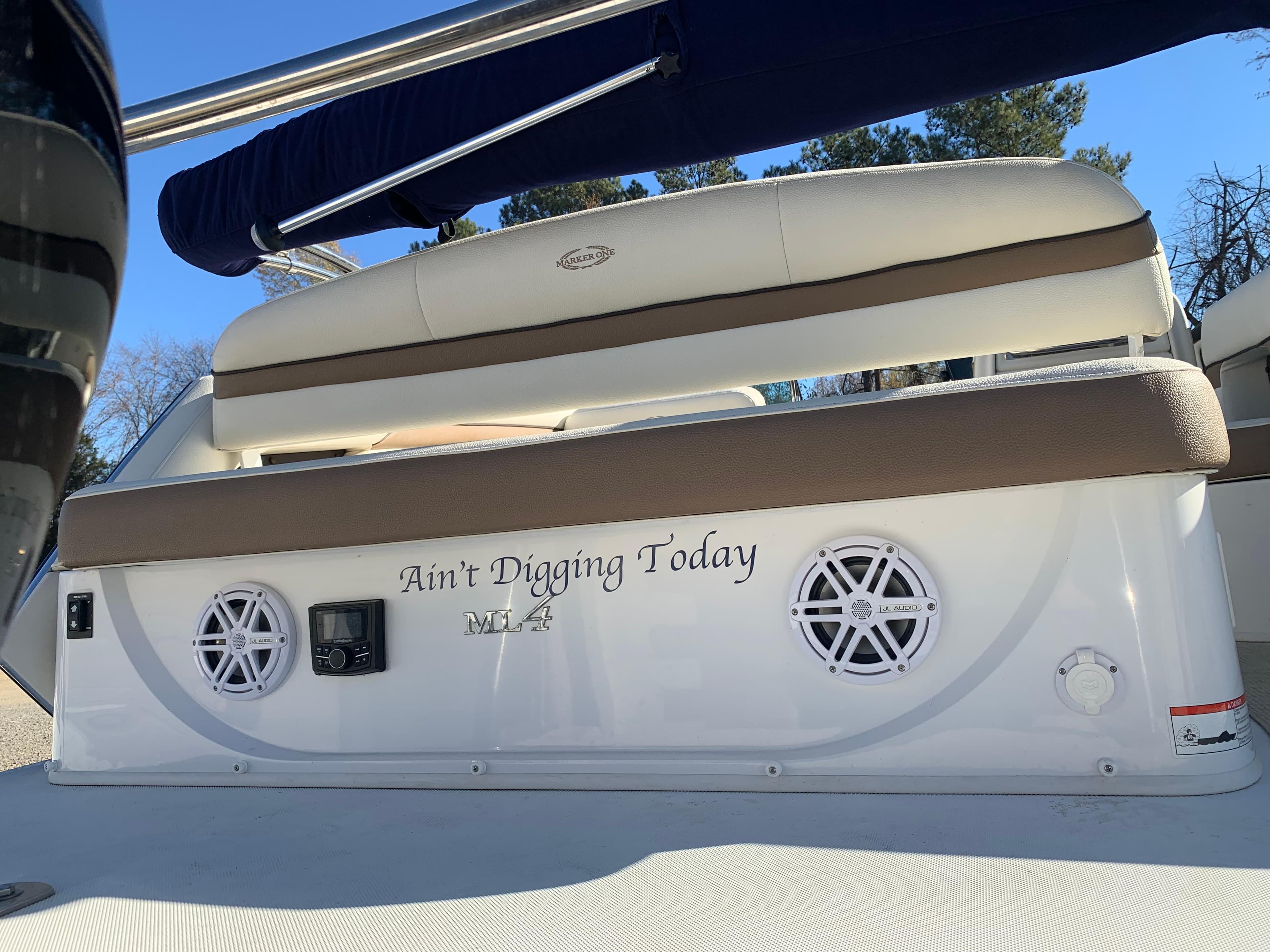 2017 Marker One ML4 boat with custom seating and speakers, named "Ain't Digging Today."
