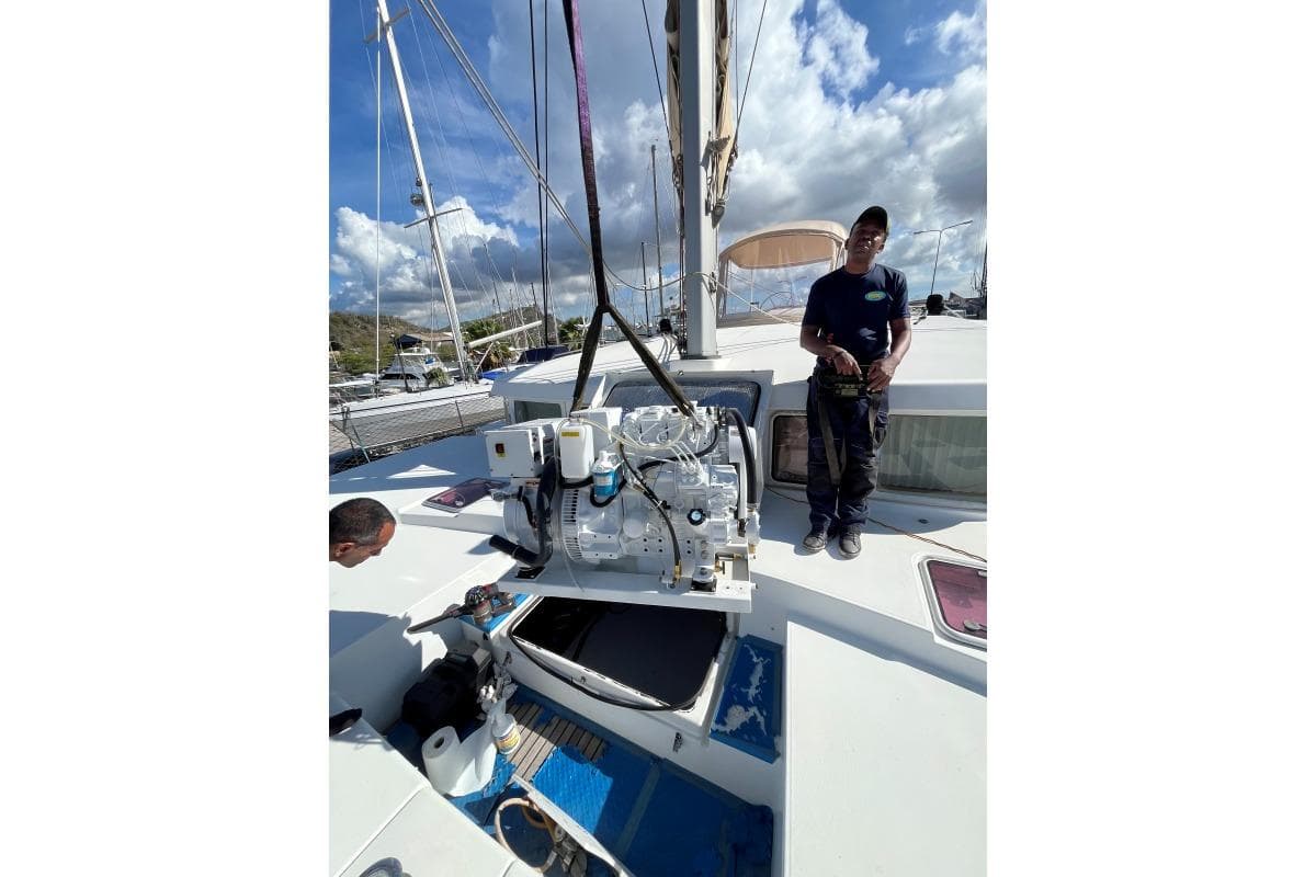 2007 Lagoon 500 yacht engine maintenance with crew on deck.