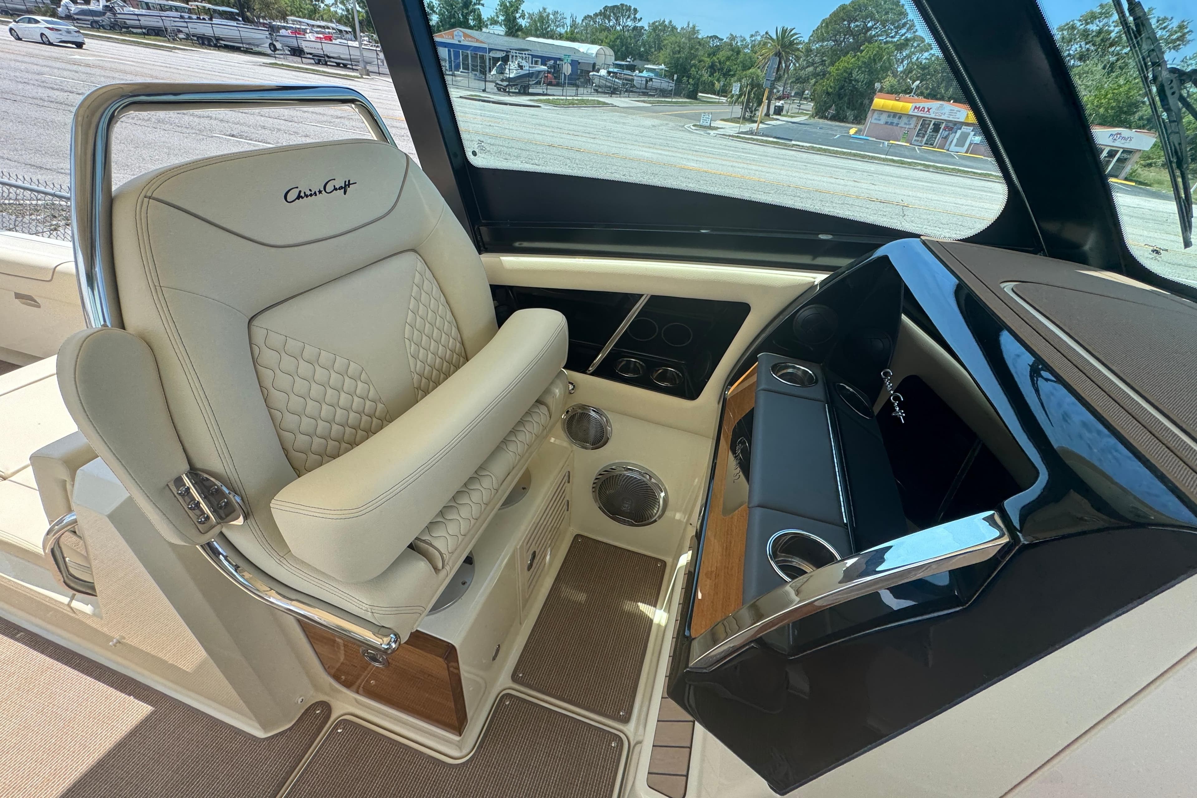 Luxurious interior of 2026 Chris-Craft Calypso 32 boat with elegant seating and dashboard.