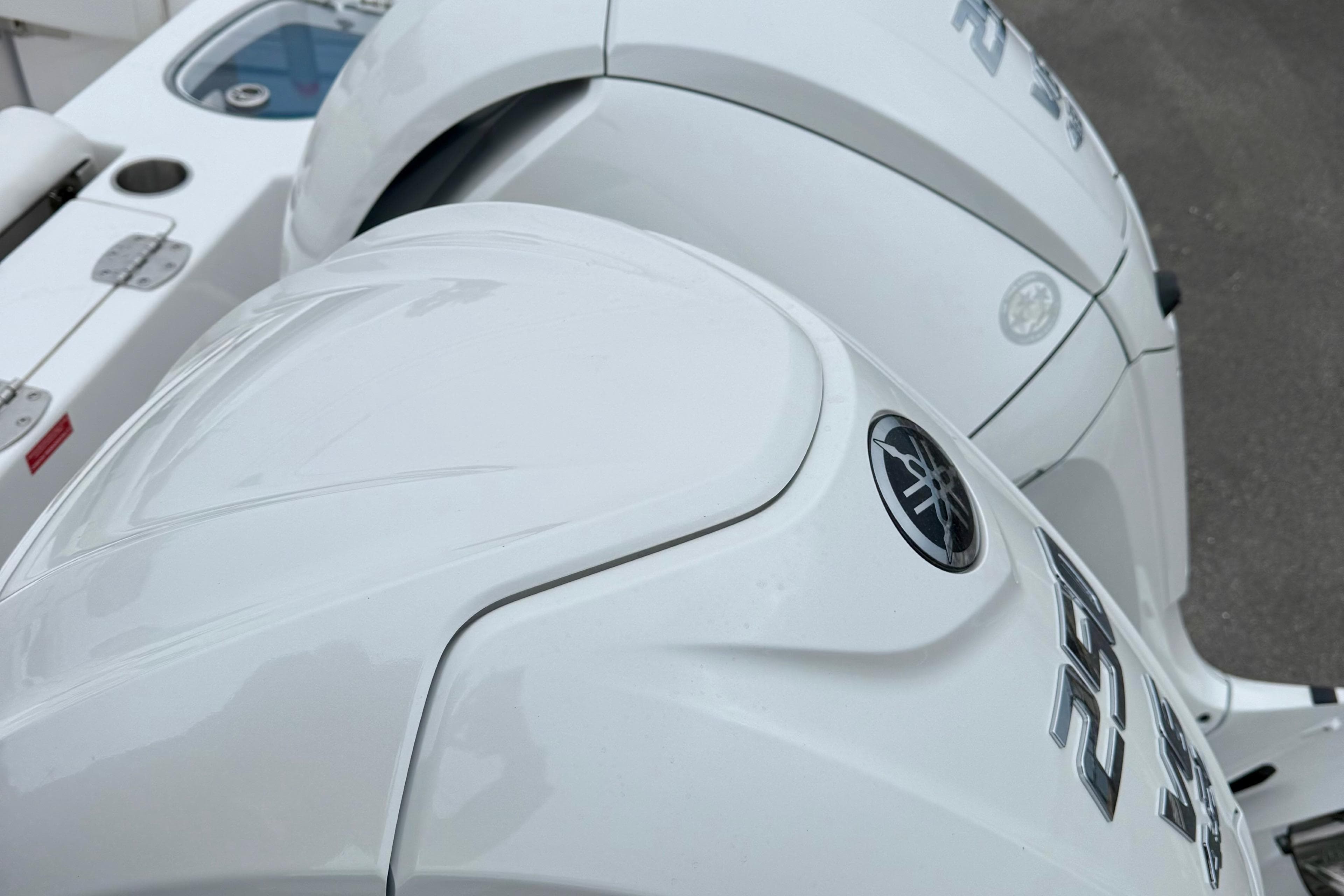 2026 Tidewater 282 CC Adventure boat with dual Yamaha outboard engines.