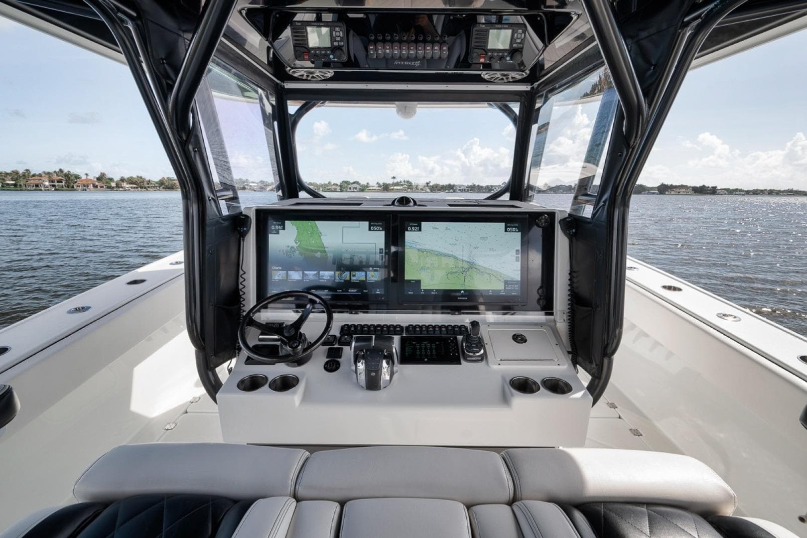 Cockpit of 2020 Freeman 42LR boat with advanced navigation system on open water.