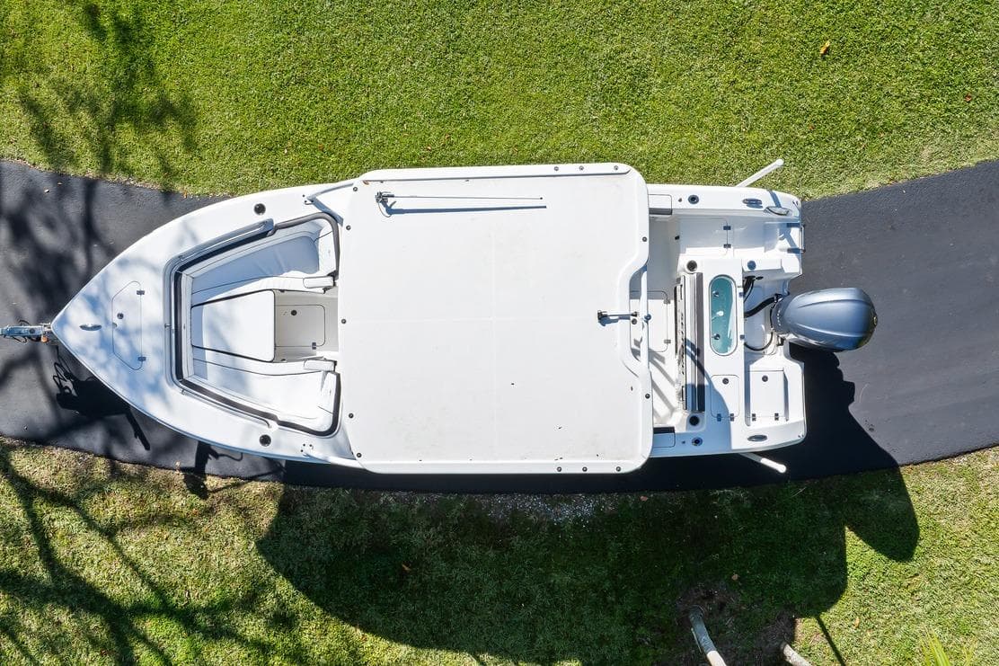 Overhead view of 2024 Sea Pro 240 Dual Console boat on grass.
