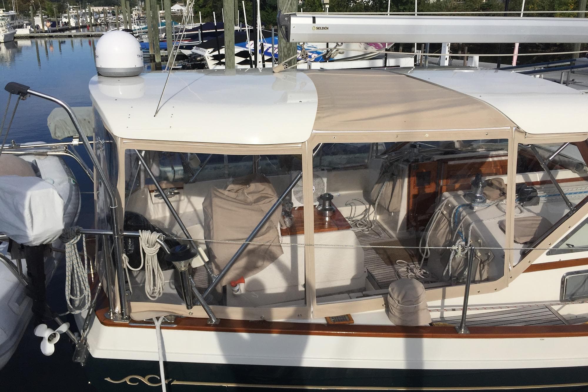 Sailboat Gozzard 44B MKII, 2002 model, docked with covered cockpit and visible rigging.
