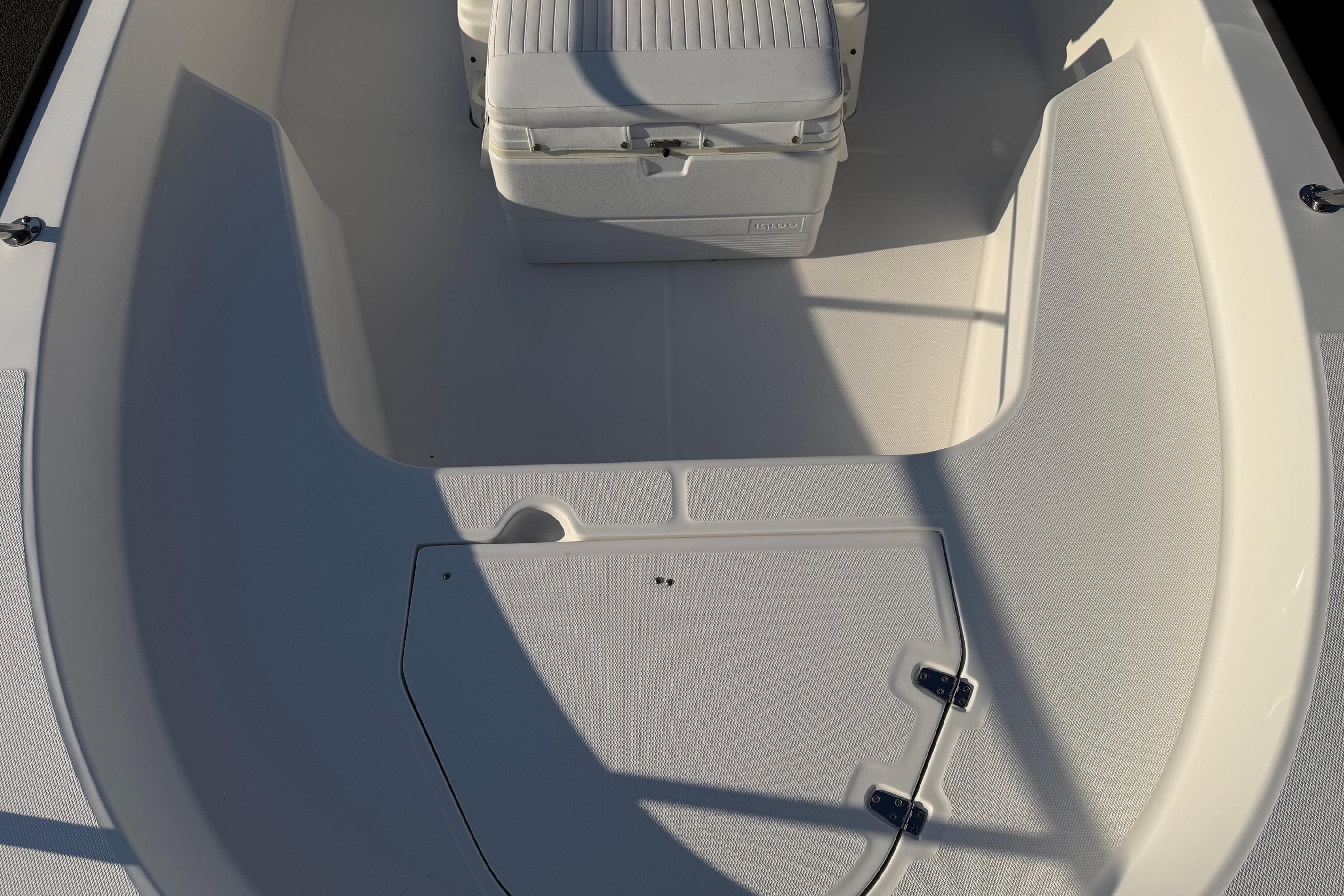 2014 Boston Whaler 190 Montauk boat interior with seating and storage.