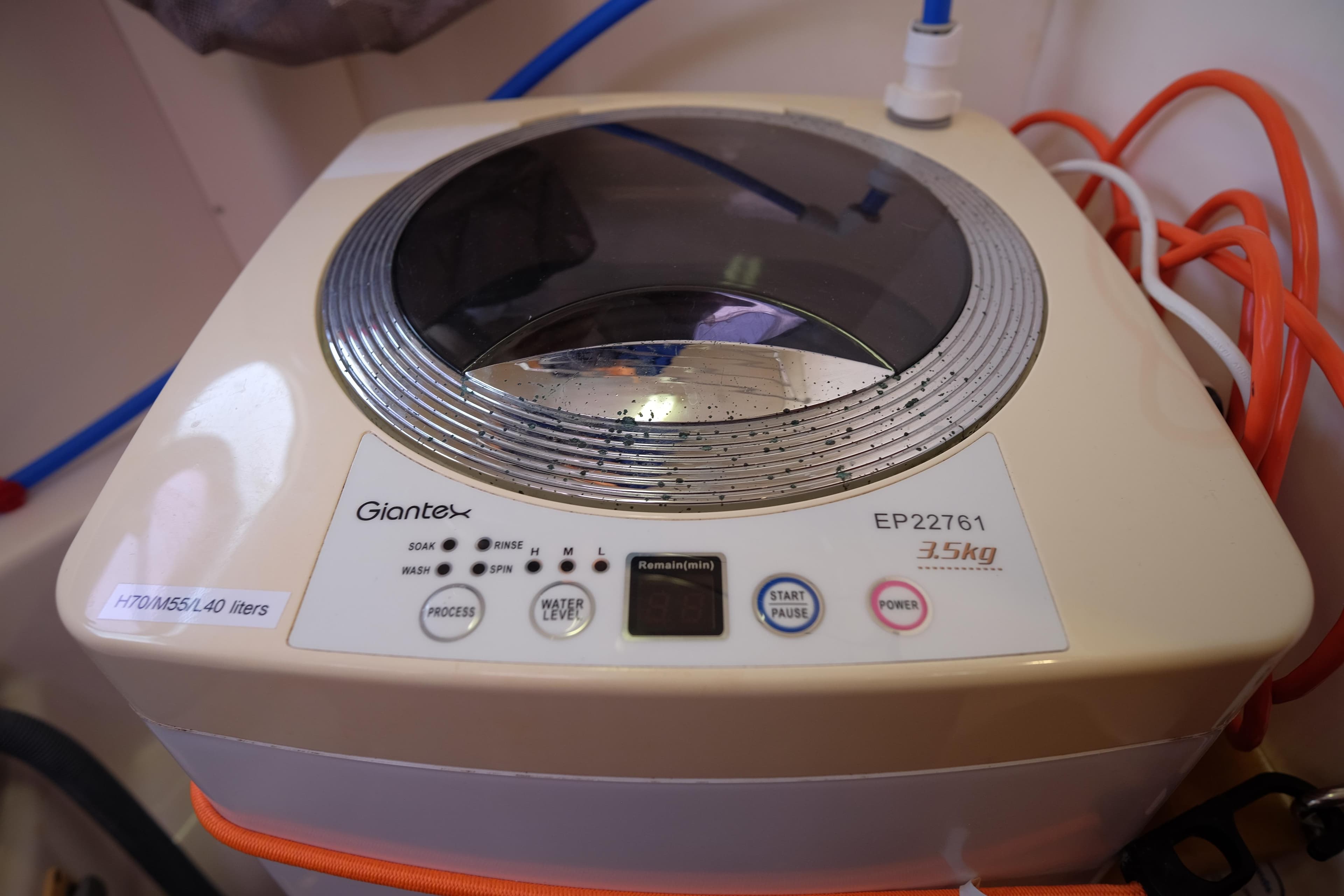 Compact Giantex washing machine in a Leopard 46 yacht, model EP22761, 3.5kg capacity.