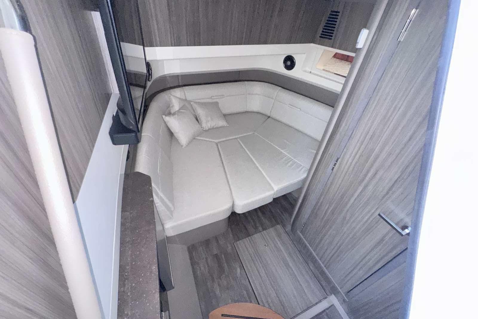 2024 Sea Ray SLX 400 cabin interior with modern design and comfortable seating.
