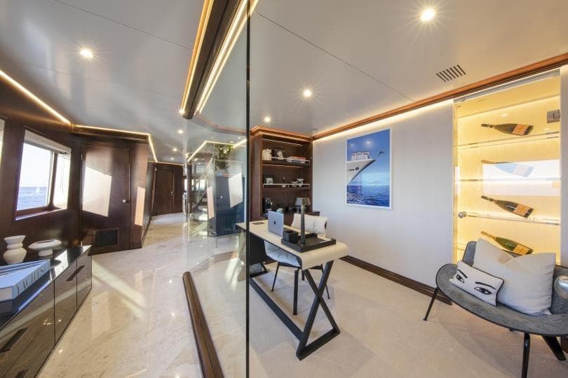 Luxurious yacht interior with modern decor, glass walls, and elegant lighting, Absolute Semi Displacement 1998.