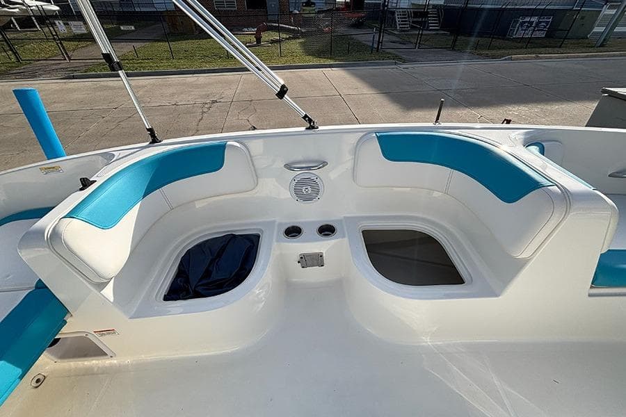2021 Bayliner Element E16 boat interior with blue and white seating.