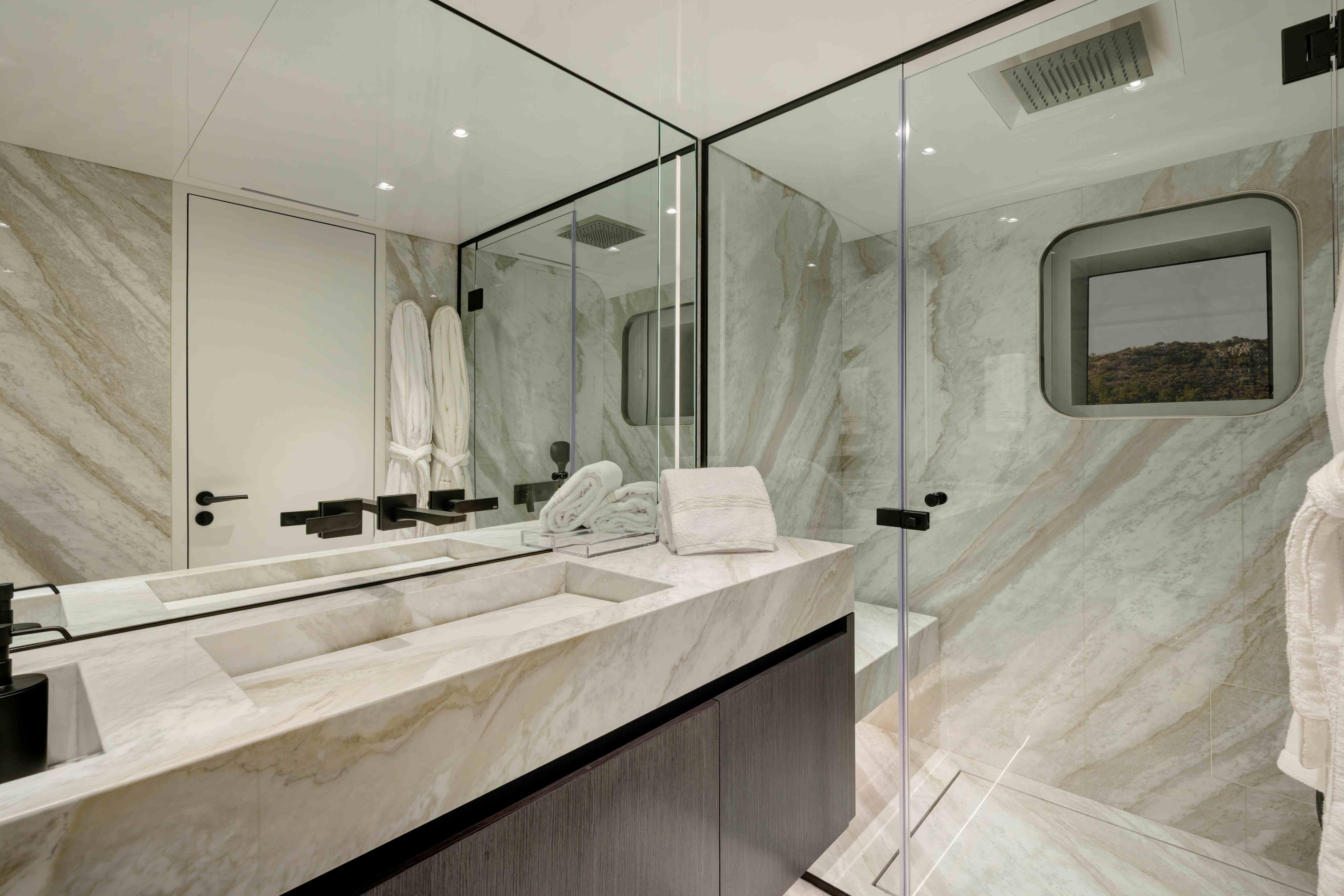 Luxurious marble bathroom in 2025 Ada Yacht 50 Z, featuring modern fixtures and elegant design.