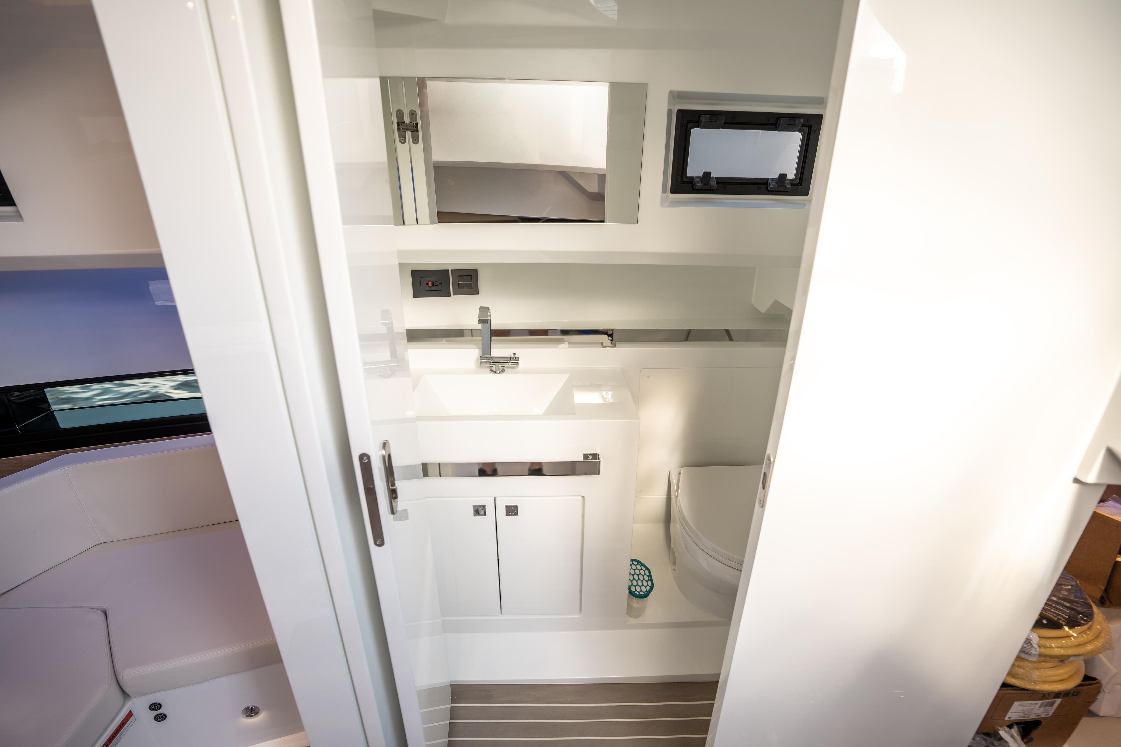 Modern bathroom interior of 2025 De Antonio Yachts D36 OPEN, featuring sleek design and compact layout.
