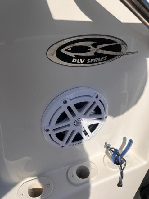 2019 Carolina Skiff 258 DLV boat with speaker and DLV Series logo.