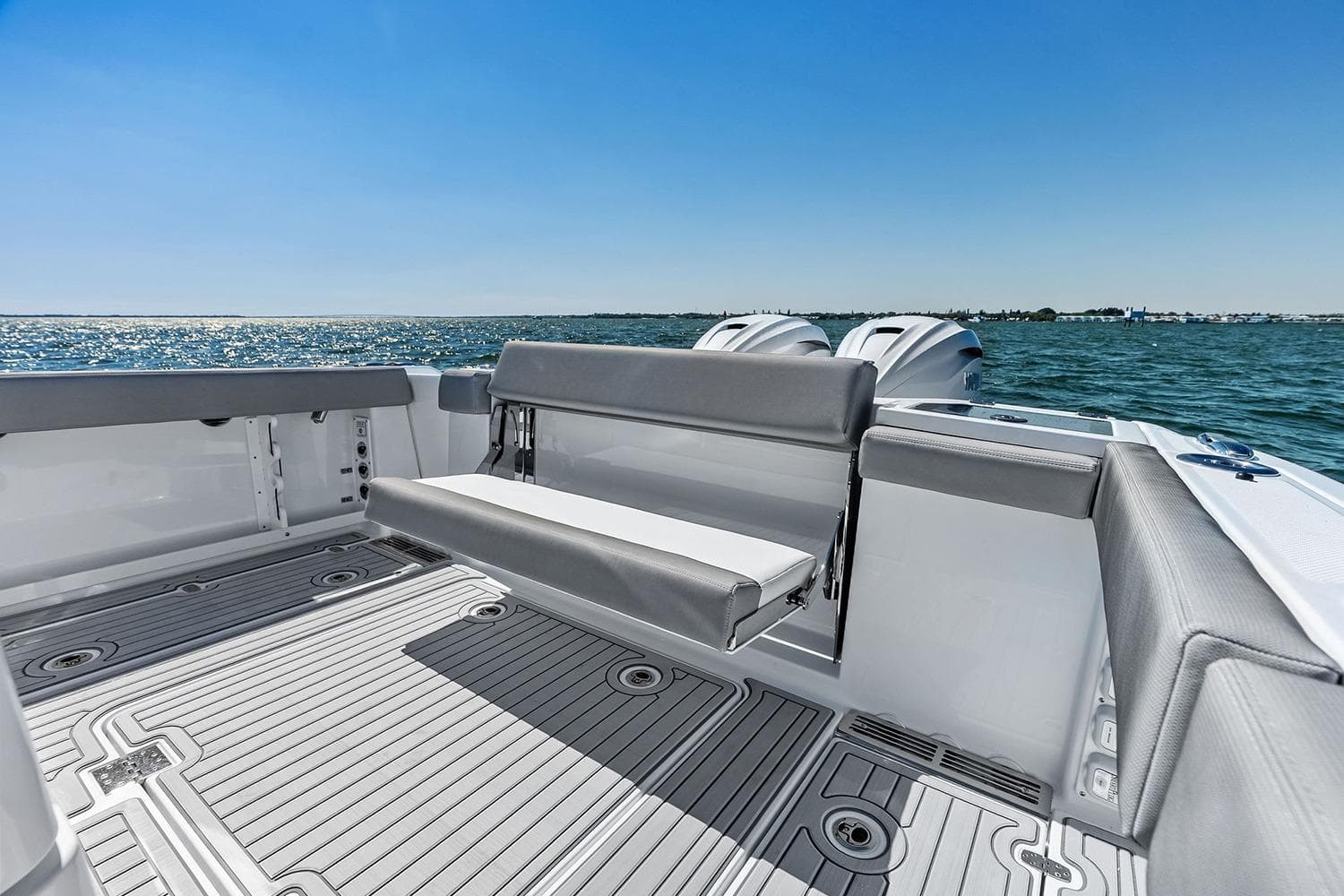 Manufacturer Provided Image: 2025 Everglades 367 CX boat with spacious seating, sleek design, and ocean view.