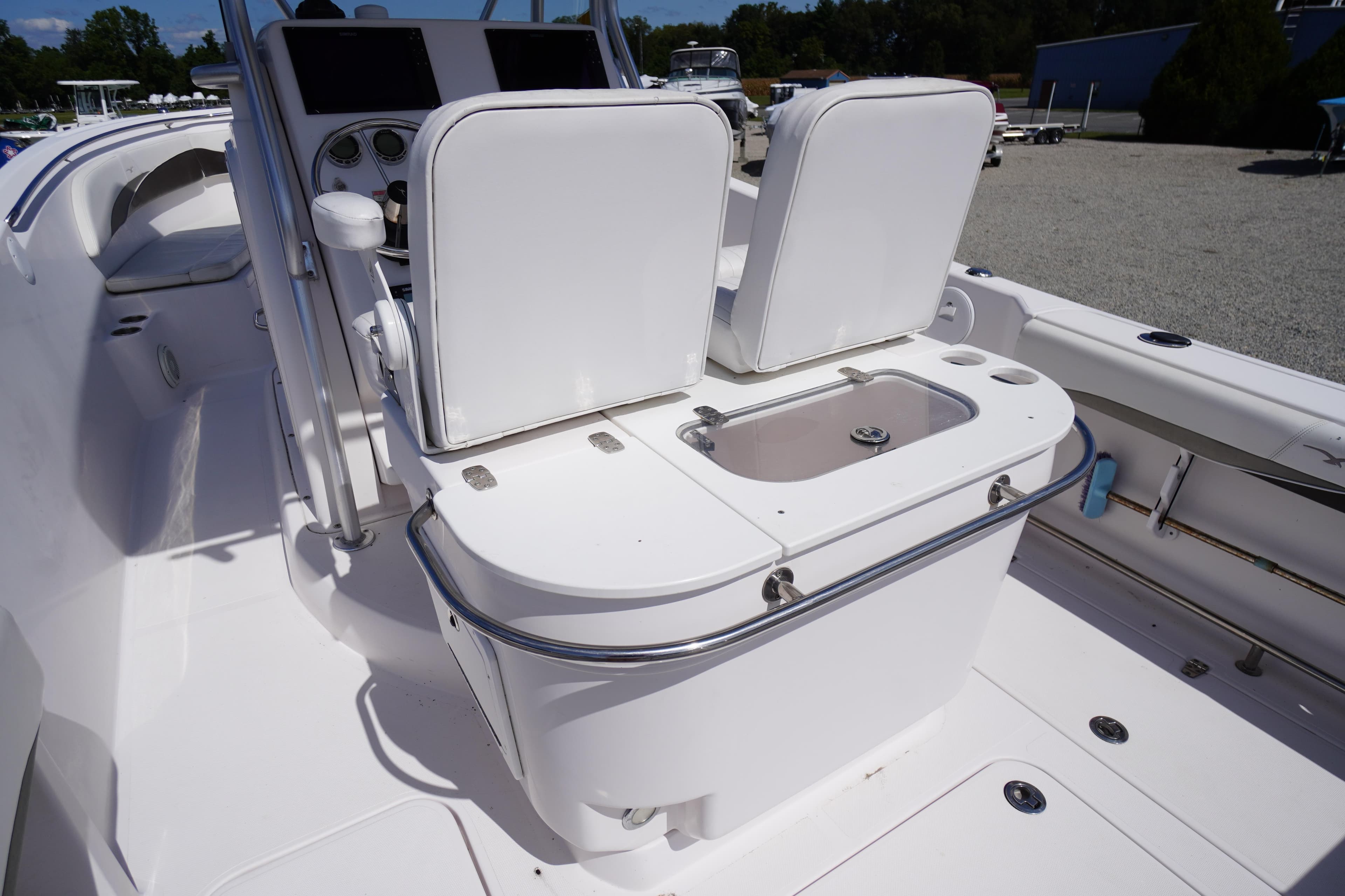 2016 Pro-Line 29 Grand Sport boat interior with dual seats and control panel.