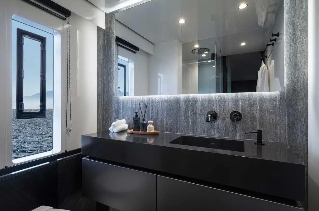 Luxurious bathroom interior of 2026 Sunreef 70 Sunreef Power yacht with modern fixtures.