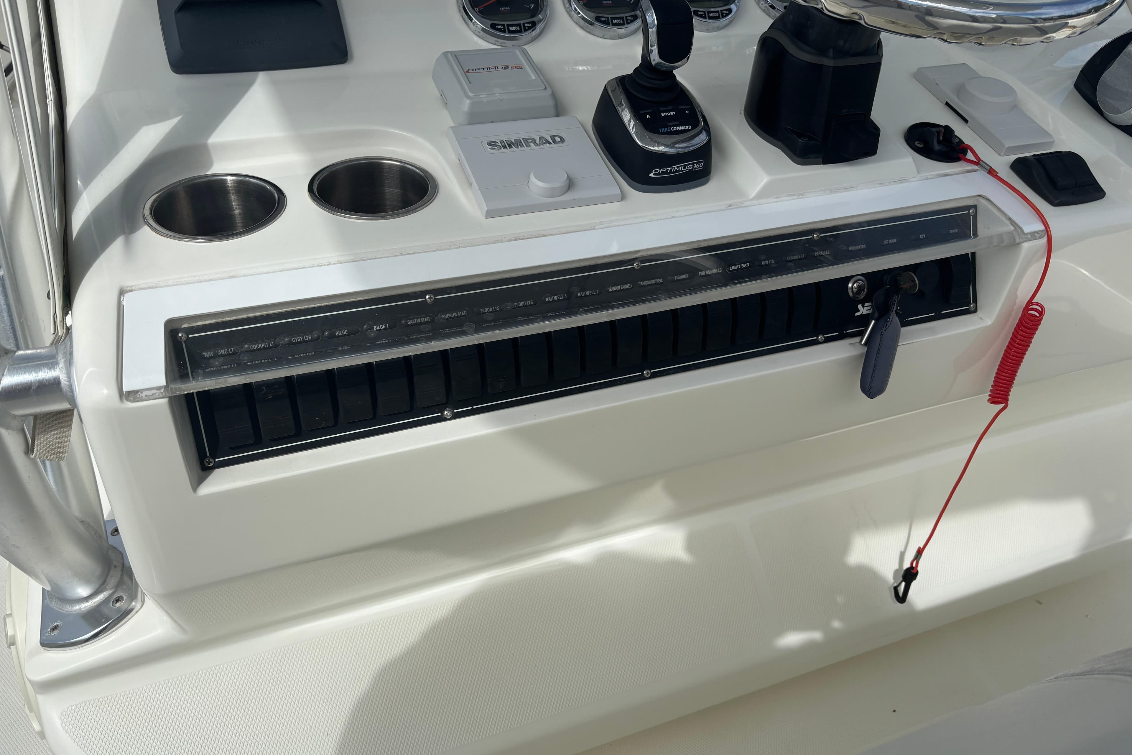 Control panel of a 2018 SeaVee 390Z boat with navigation and engine controls.