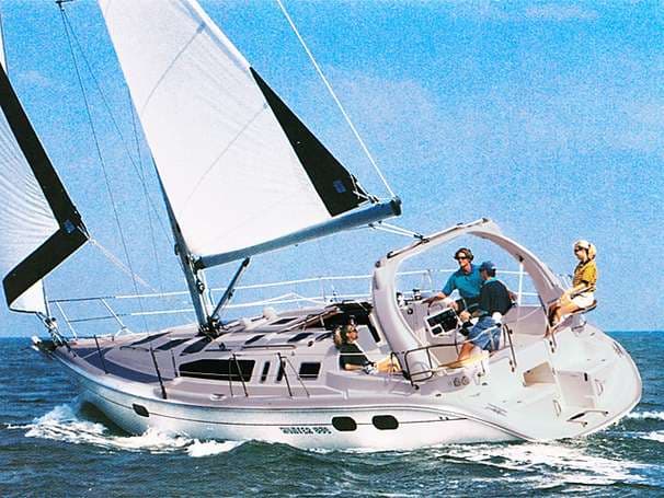 1999 Hunter 380 sailboat cruising on the ocean.