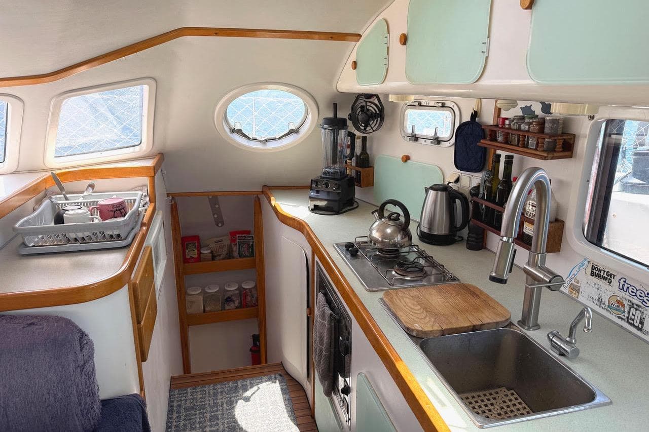 2004 Outremer Standard yacht kitchen with modern appliances and ample storage.