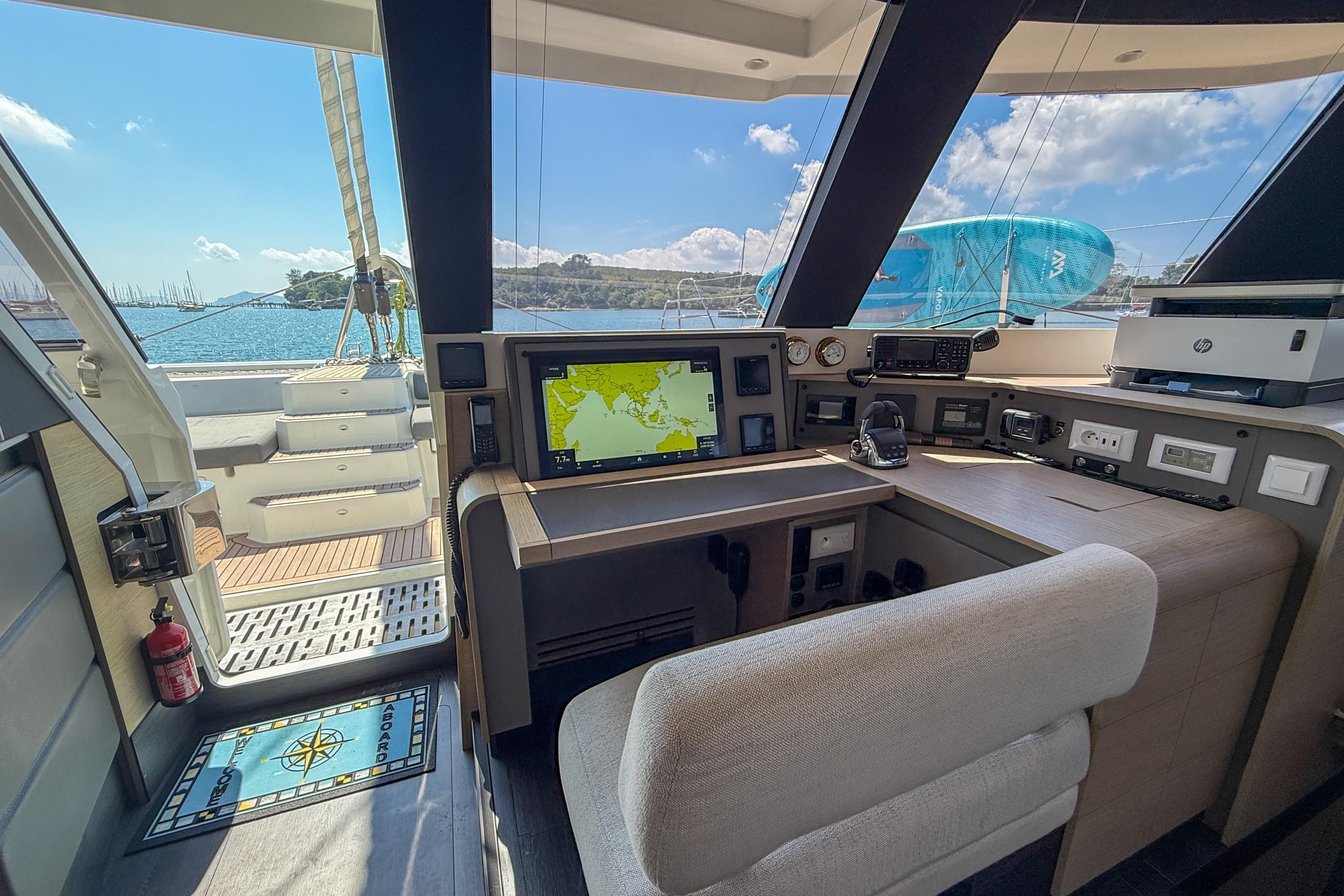 Interior view of 2021 Fountaine Pajot Samana 59 yacht cockpit with navigation equipment.