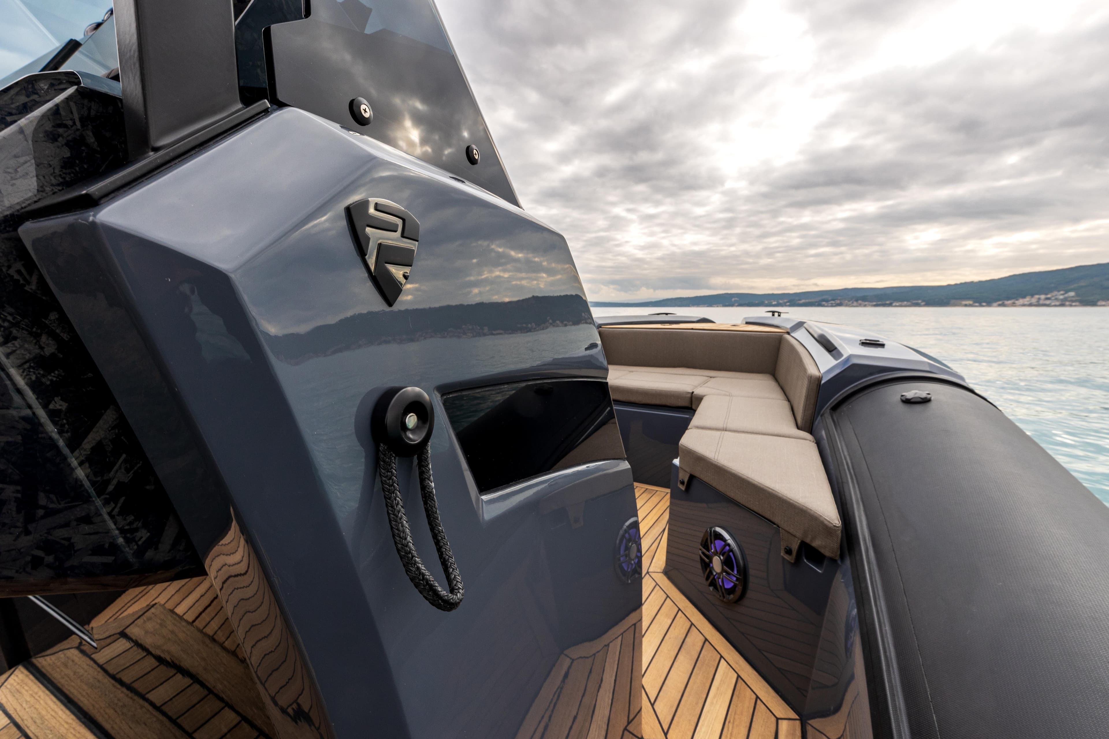 2026 SuperRib Open 27 boat with sleek design, luxury seating, and modern features on calm water.