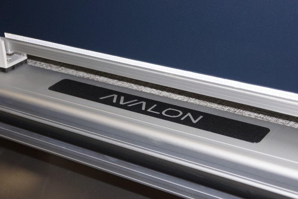 2026 Avalon VLS Quad Lounge 21' logo on sleek metallic surface.