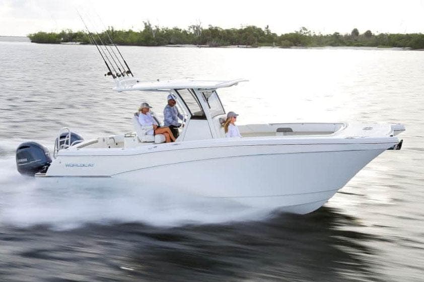 Manufacturer Provided Image: 2026 World Cat 280 CC-X cruising on water with passengers, showcasing sleek design and performance.