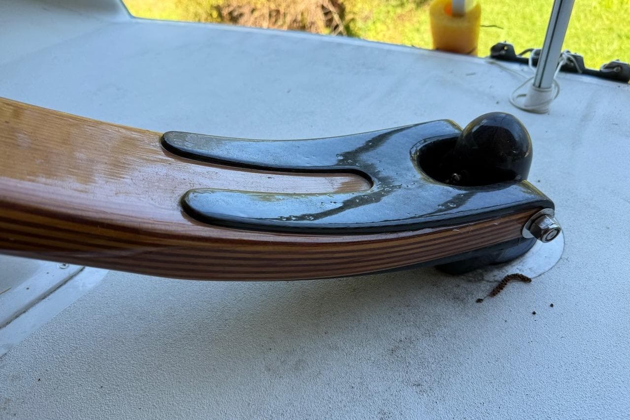 Close-up of a Hallett 33 boat component, showcasing wood and metal details, 2007 model.