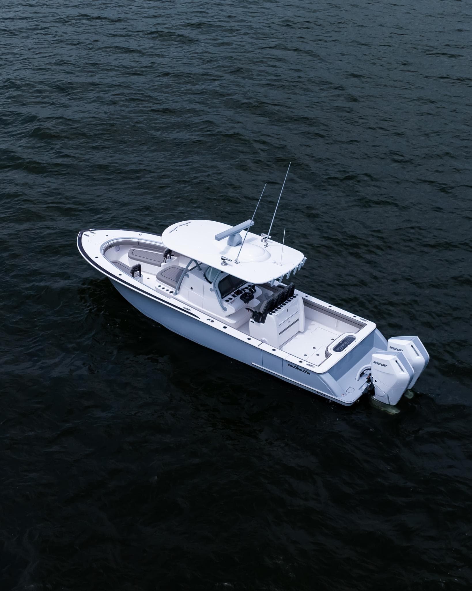 2025 Valhalla Boatworks V-33 on open water, aerial view.