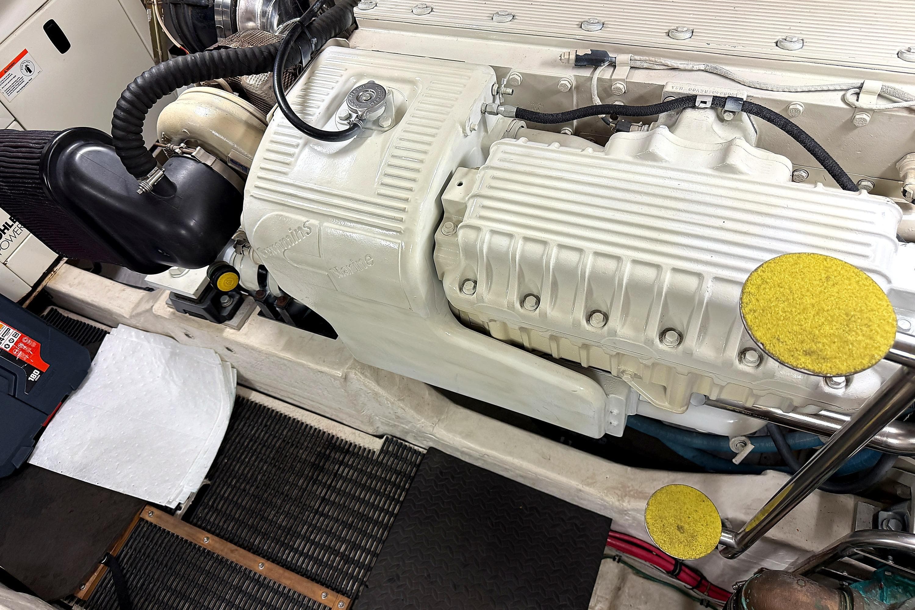 Engine compartment of a 2004 Tiara Yachts 4200 Open, showcasing detailed components.