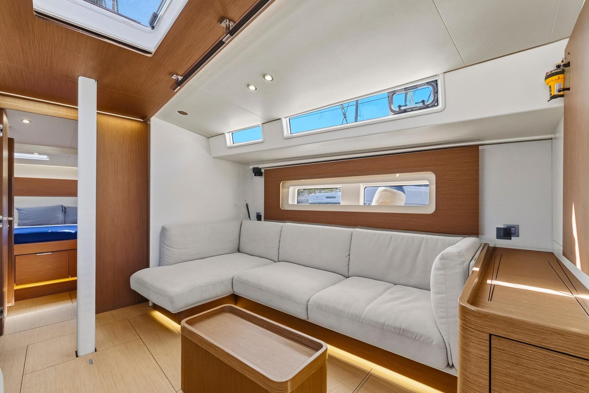 Luxurious interior of 2024 Beneteau Oceanis Yacht 54, featuring modern design and comfortable seating.