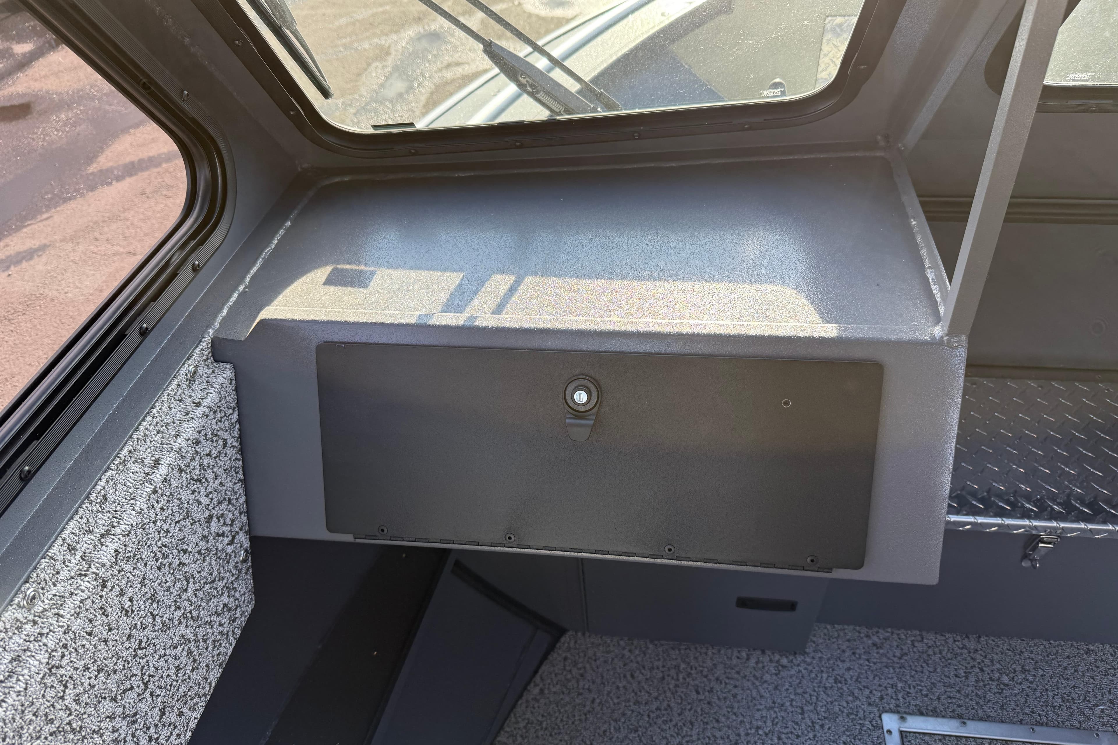 Interior view of 2026 Alumaweld Intruder Hard Top 24 boat dashboard.