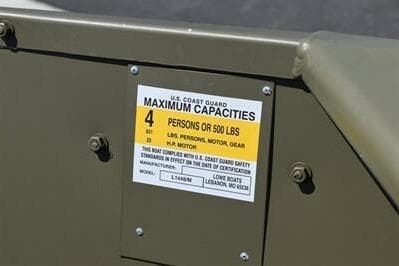 2024 Lowe L1448M Jon boat capacity label, indicating a maximum of 4 persons or 500 lbs.