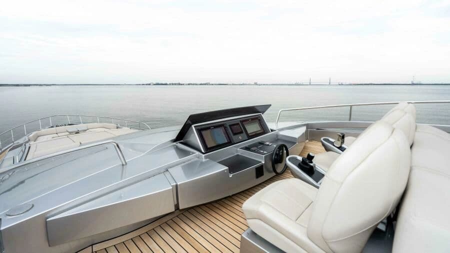 Luxurious cockpit of the 2022 Pershing 9X yacht with modern design.