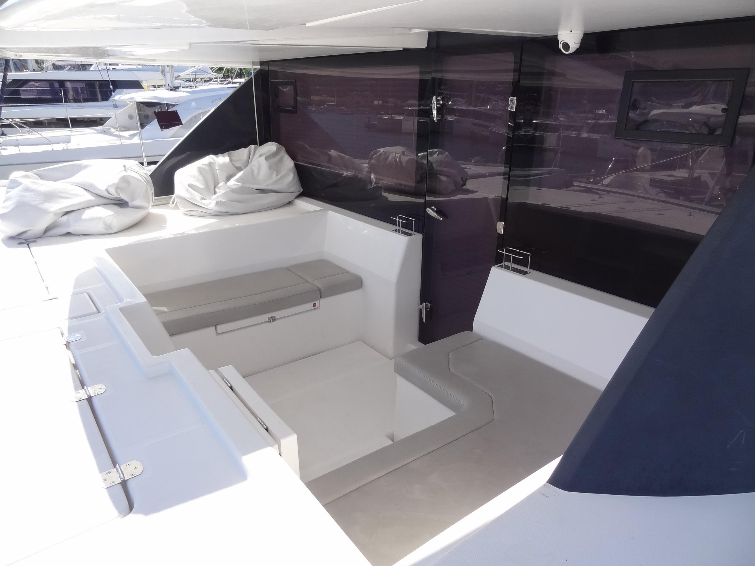 Spacious deck area of 2019 Leopard 50 yacht with seating and storage.