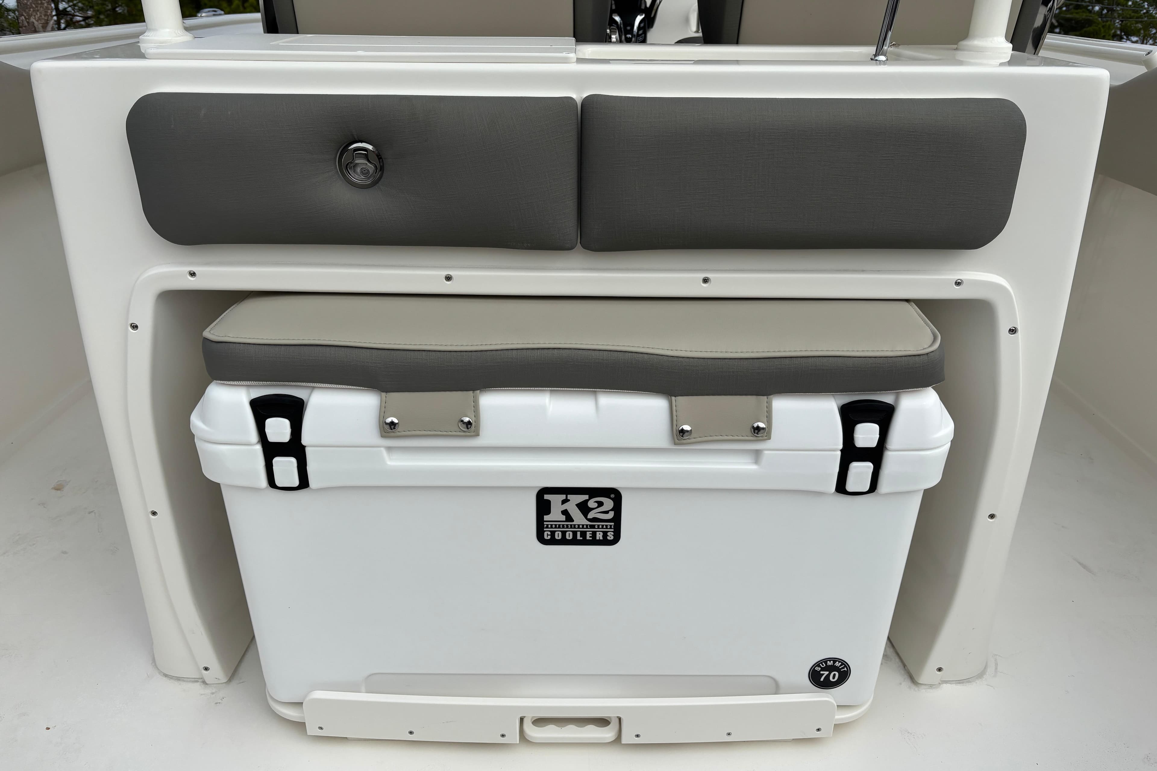 2026 Key West 263 FS boat with K2 cooler and cushioned seating.