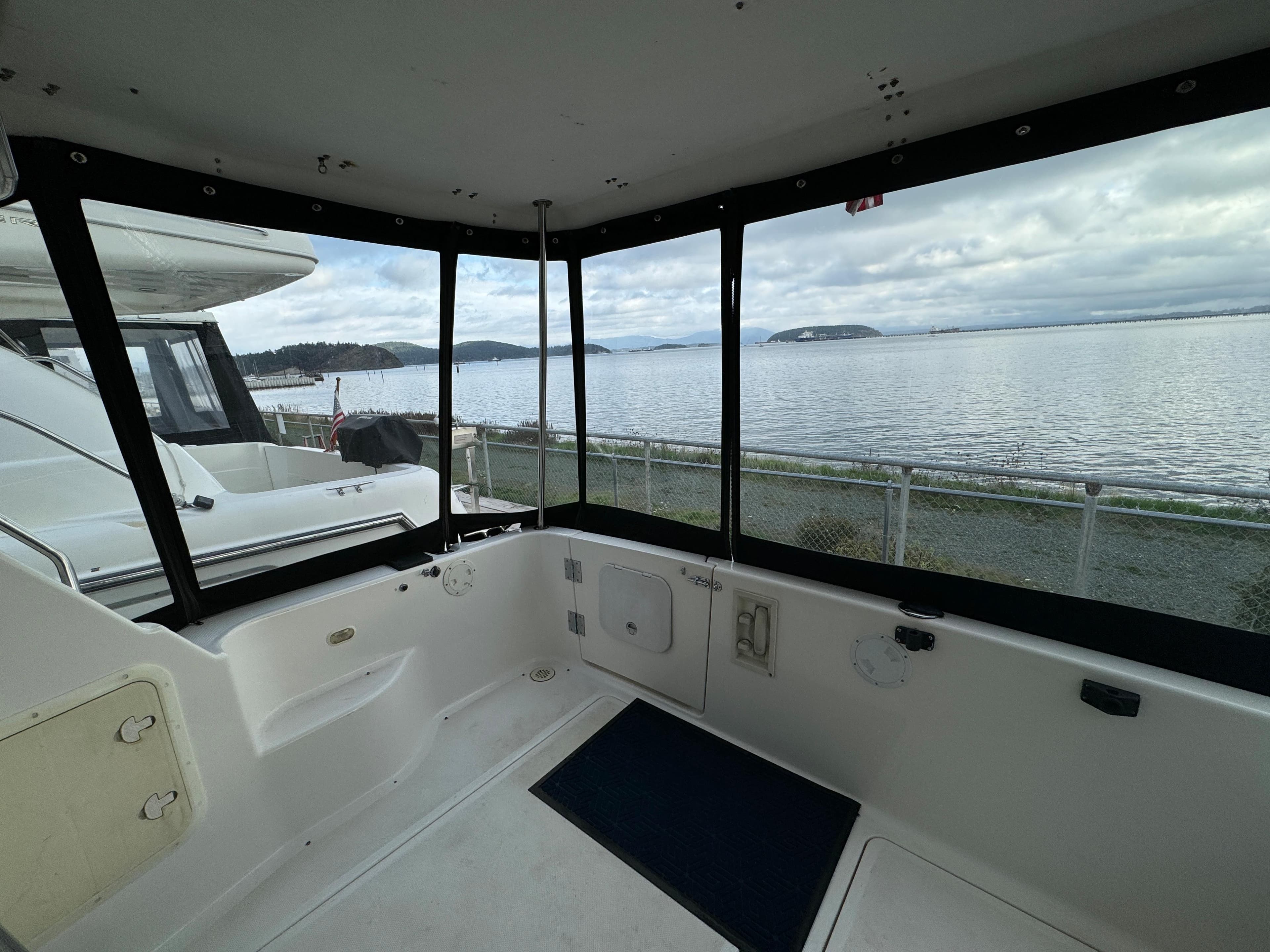 1996 Bayliner 3388 Command Bridge Motoryacht interior with scenic water view.