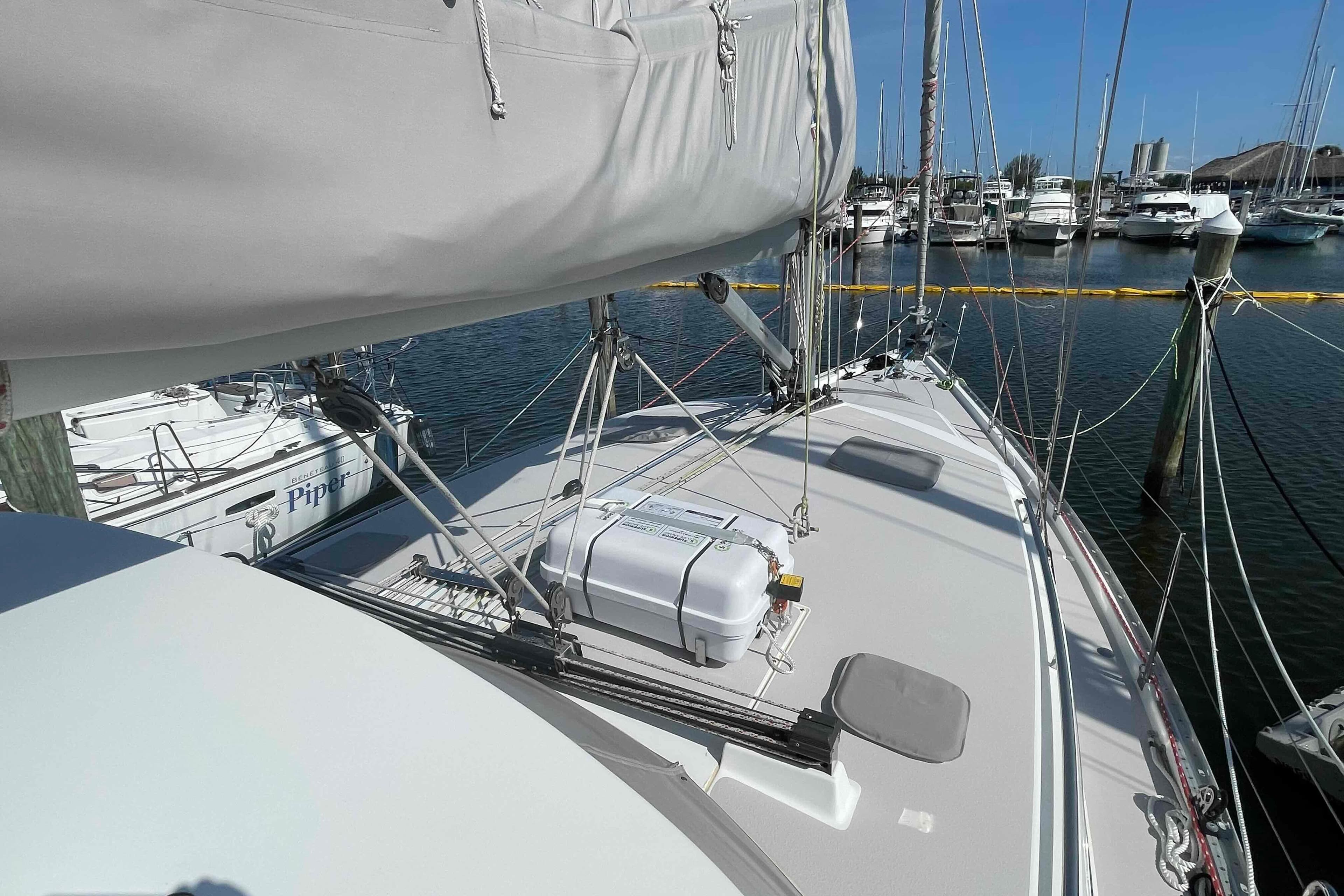 2013 Catalina Morgan 440 sailboat docked at marina, showcasing deck and rigging.