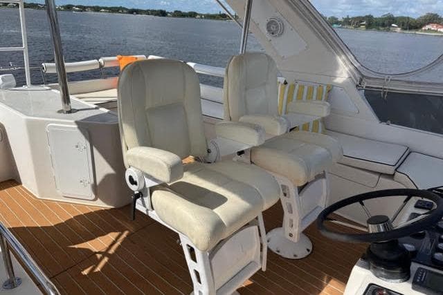 Luxury Africat Marine 420 yacht interior with plush seating, 2007 model, overlooking serene waters.