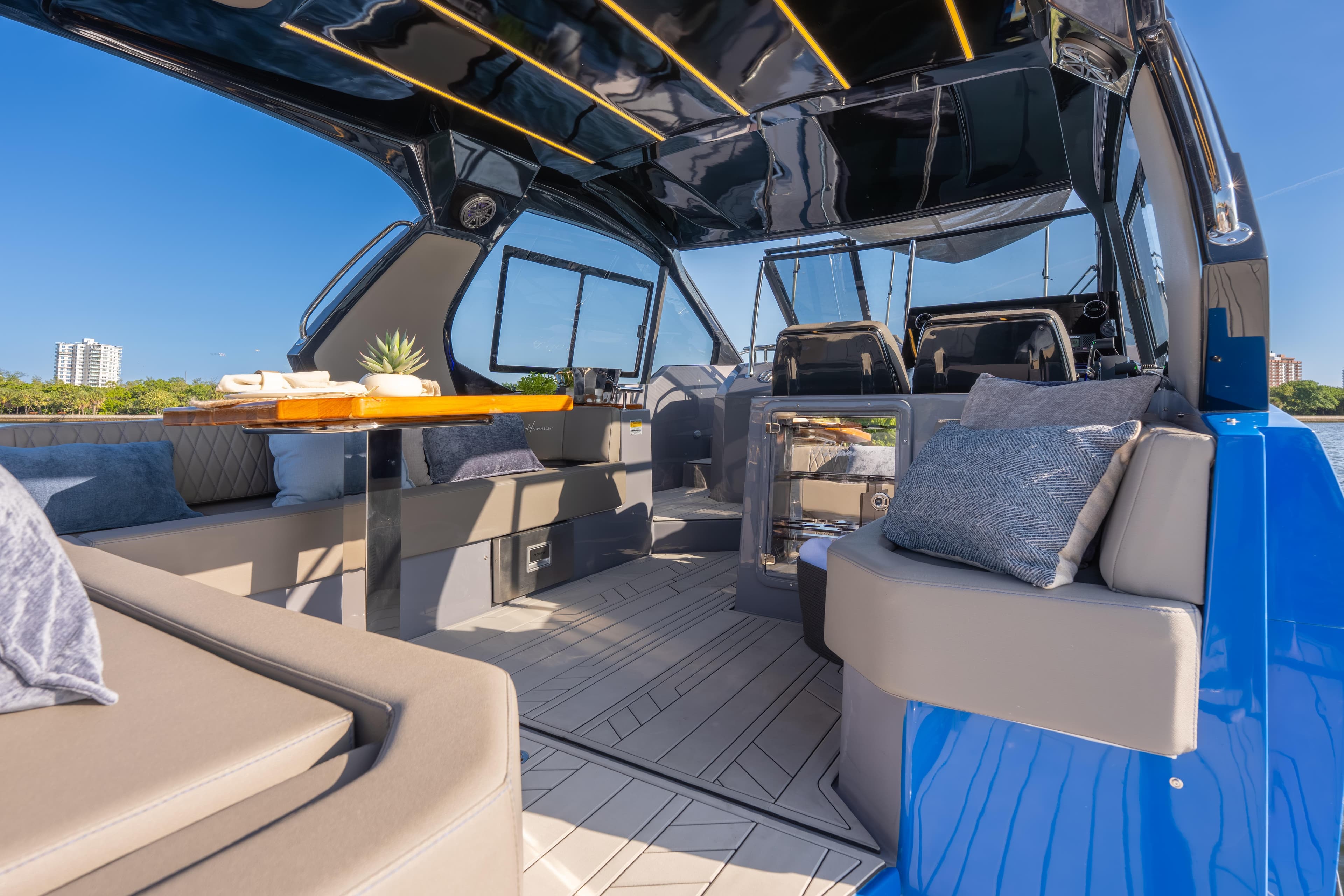 Luxurious interior of 2026 Hanover 347 yacht with modern seating and elegant design.