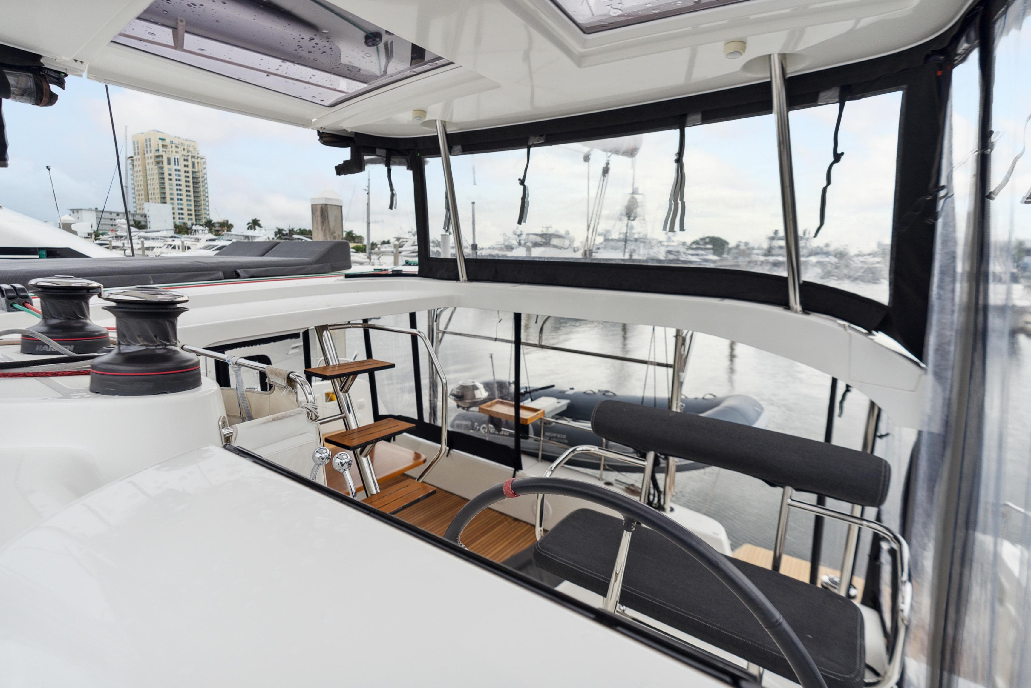 Interior view of a 2019 Lagoon 42 yacht in the harbor.