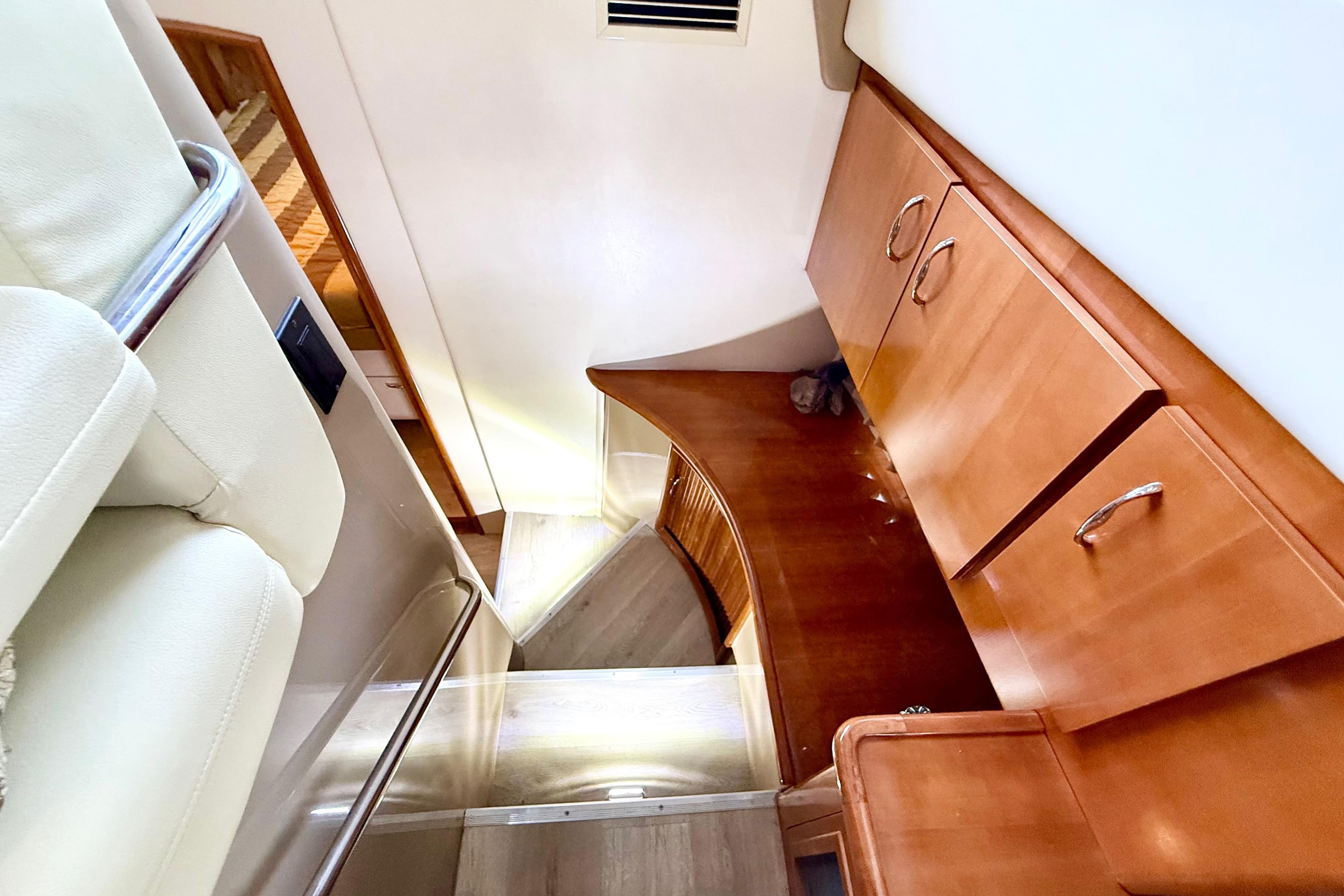 Interior of 2004 Carver 360 Sport Sedan with wooden cabinetry and modern design.