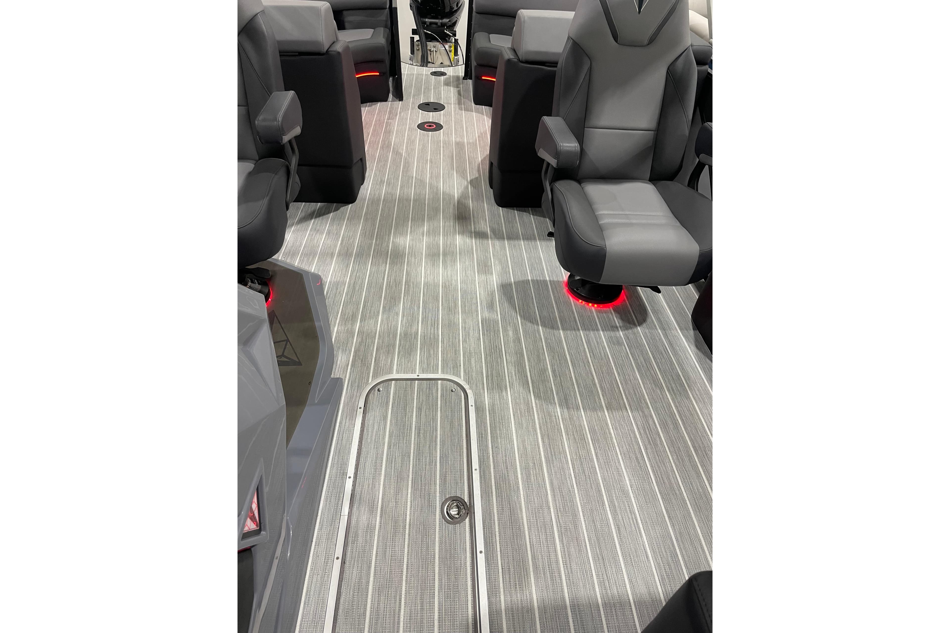 2025 Trifecta 23RFSS boat interior with sleek seating and modern flooring design.