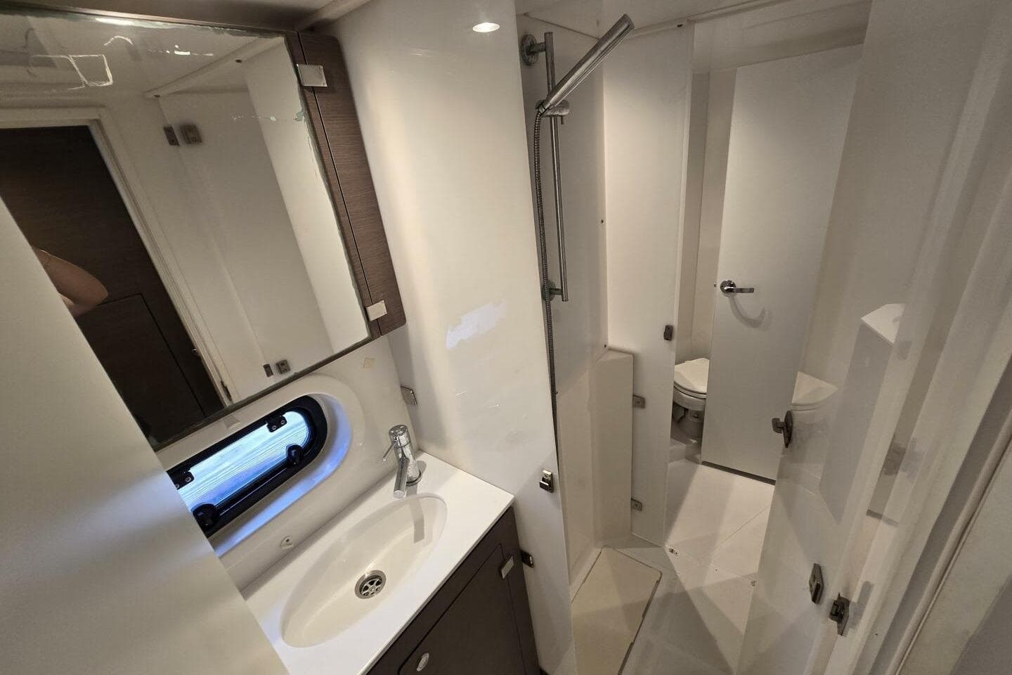 Modern bathroom in 2021 Bali 4.2 yacht with sleek fixtures and compact design.