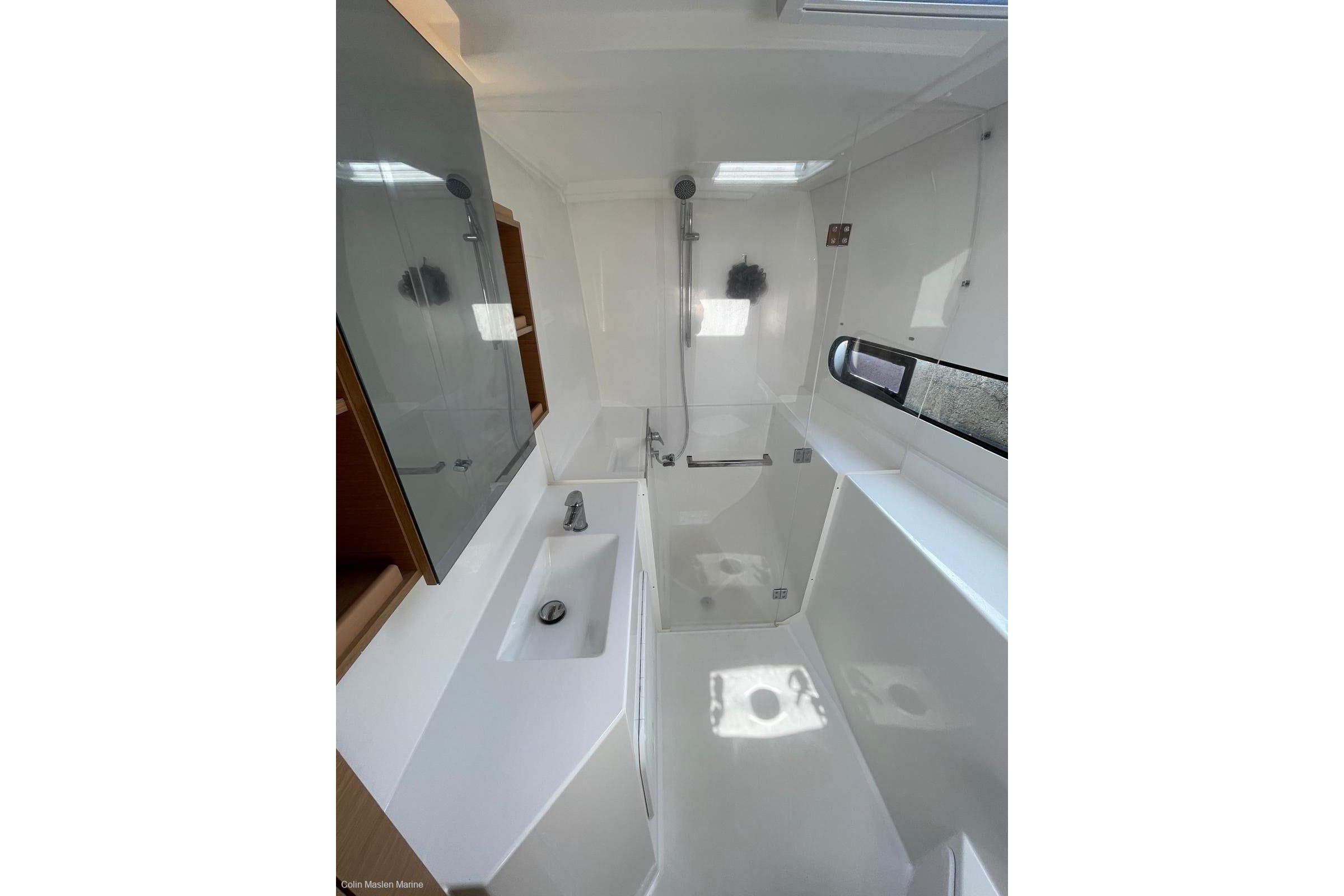 Modern bathroom interior in 2023 Excess 11 yacht, featuring sleek design and fixtures.